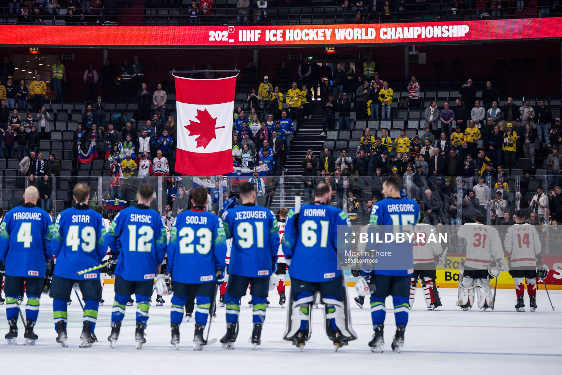 The Canadian flag is raised