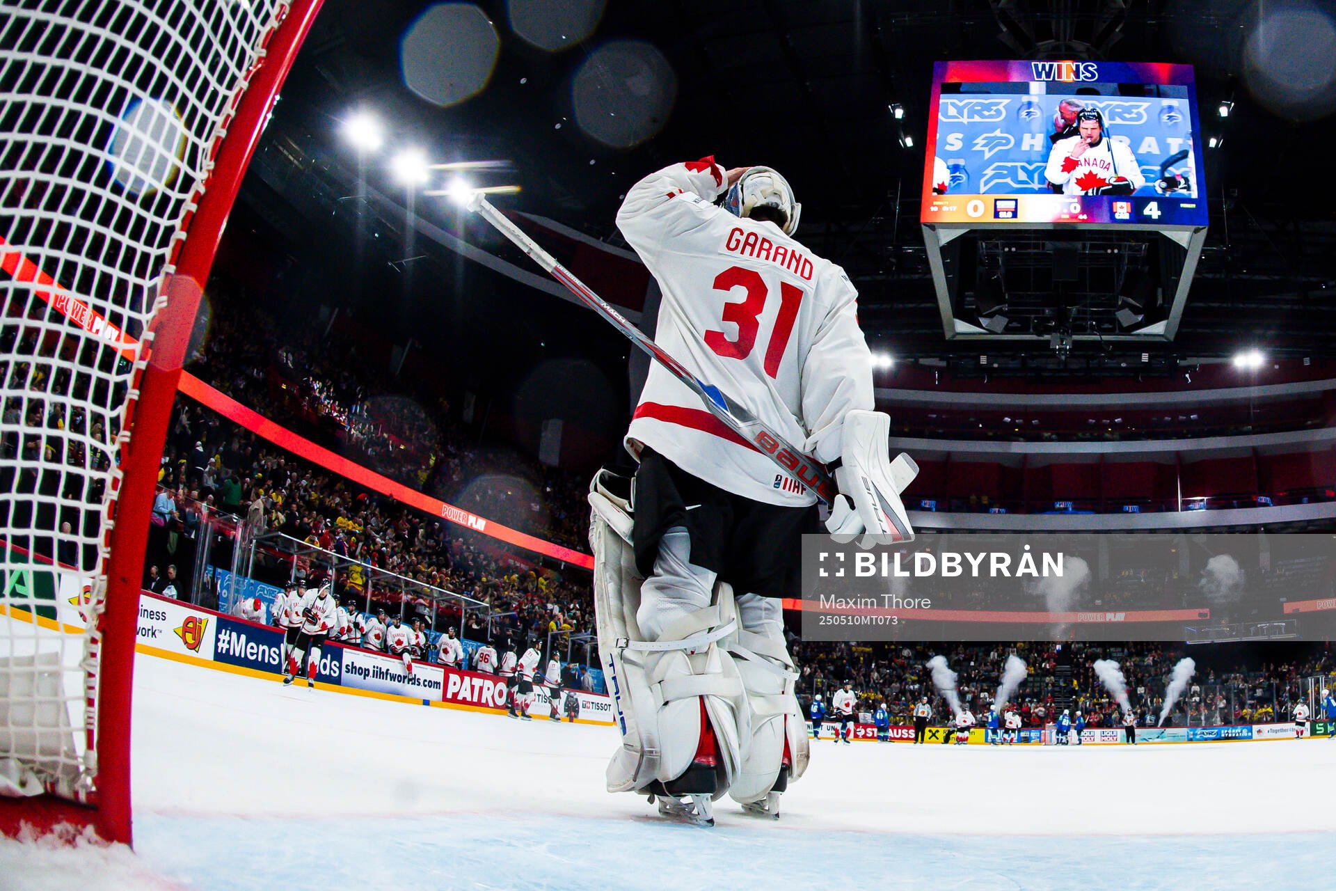 Goaltender Dylan Garand of Canada celebrates