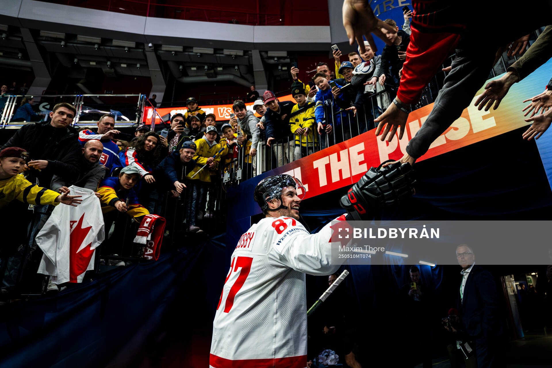 Sidney Crosby of Canada greets fans