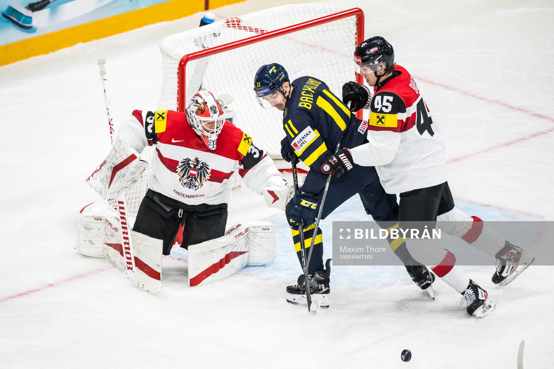 Goaltender David Kickert and Gregor Biber of Austria with