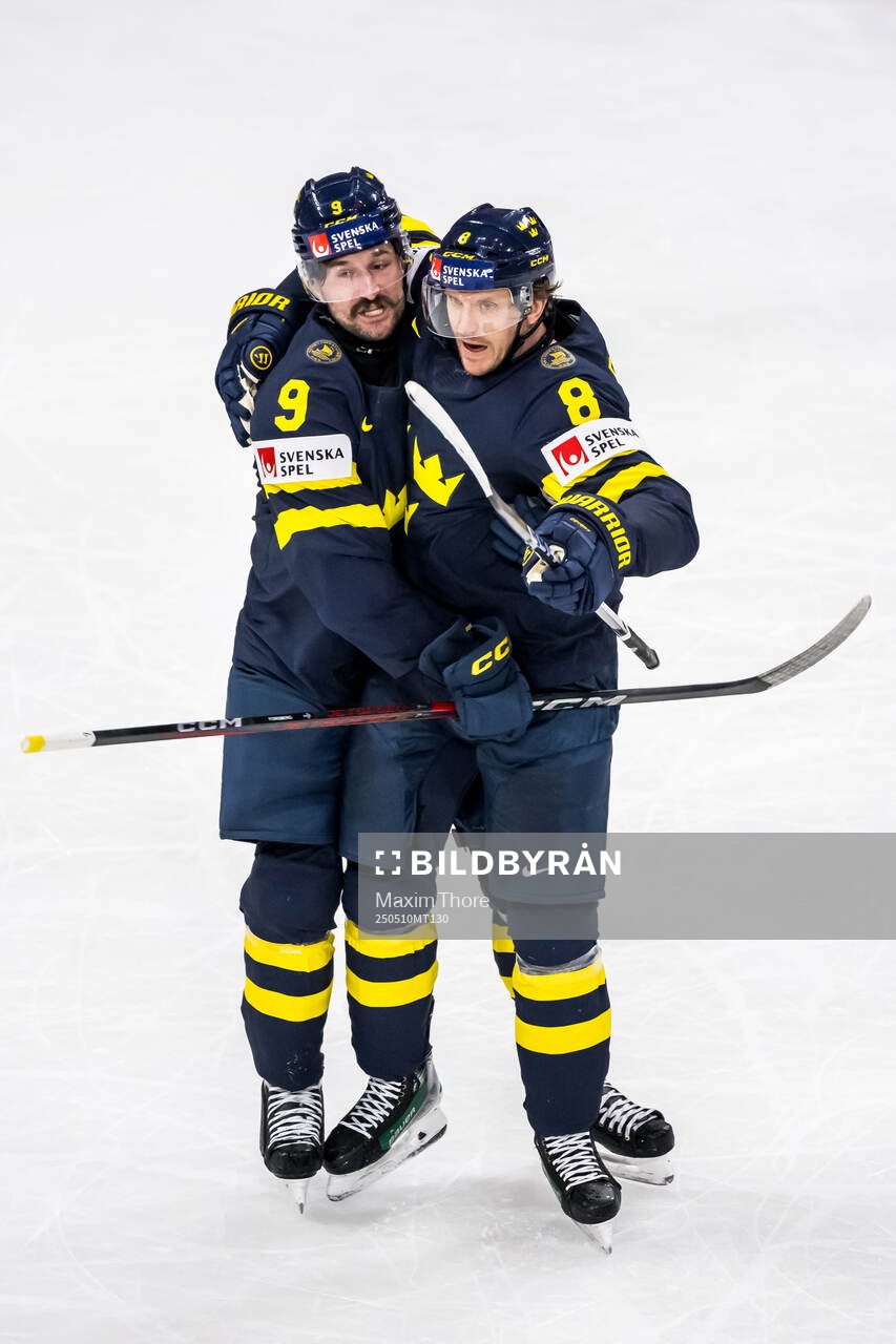 Filip Forsberg and Jonas Brodin of Sweden celebrating