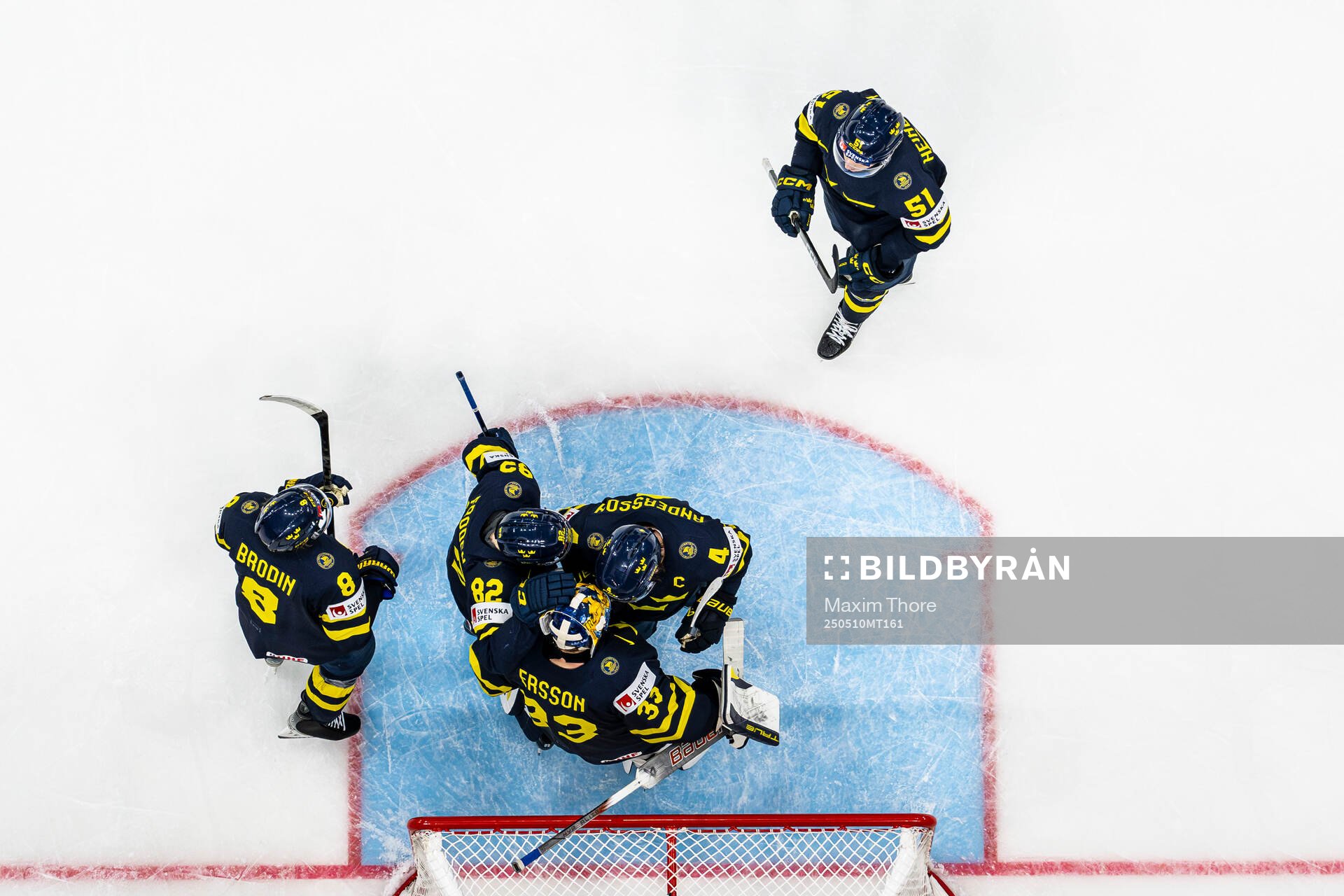 Goaltender Samuel Ersson of Sweden celebrate with Rasmus