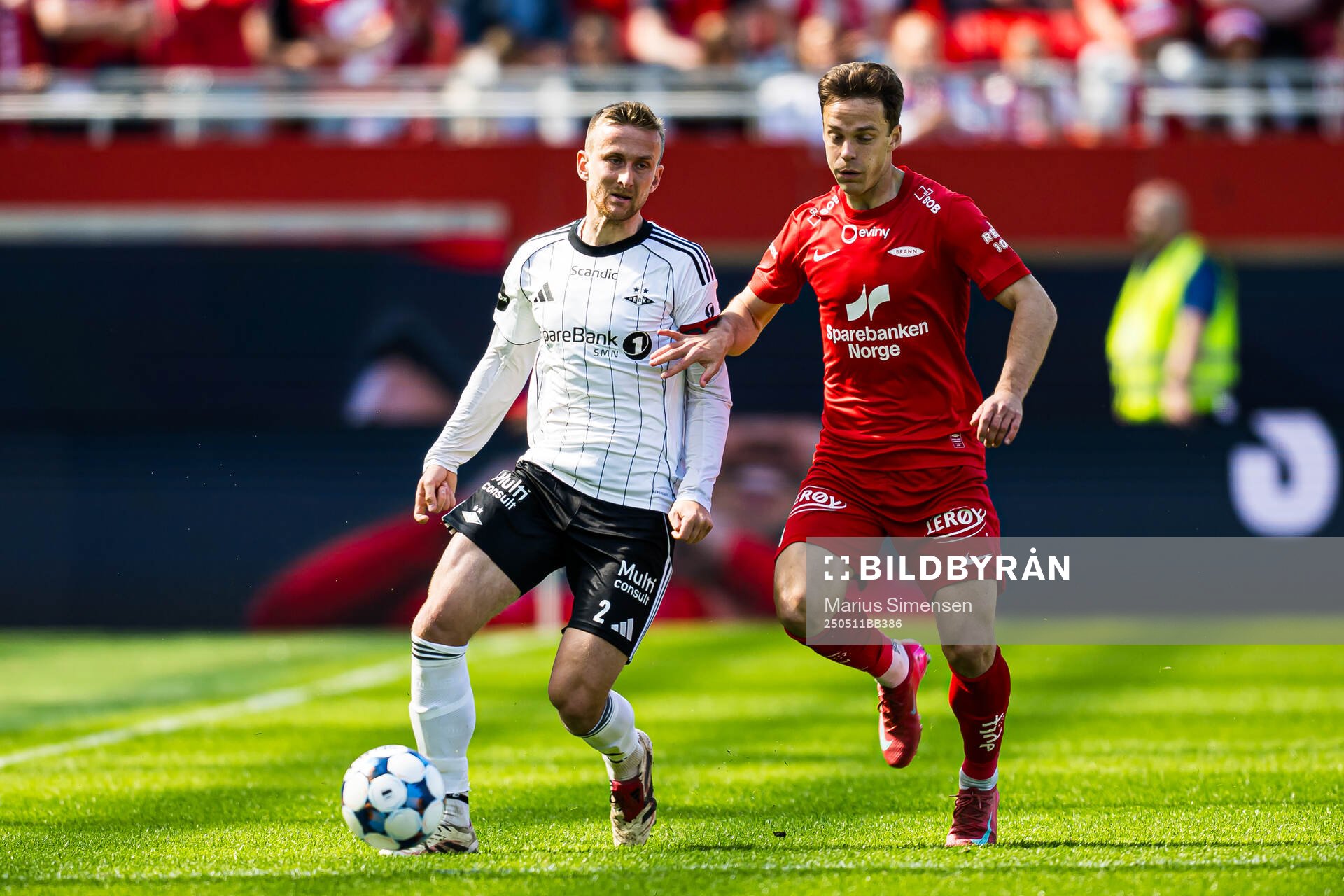 Erlend Dahl Reitan of Rosenborg and Felix Horn Myhre of Brann during the Eliteserien match between Brann and Rosenborg on May 11, 2025 in Bergen.