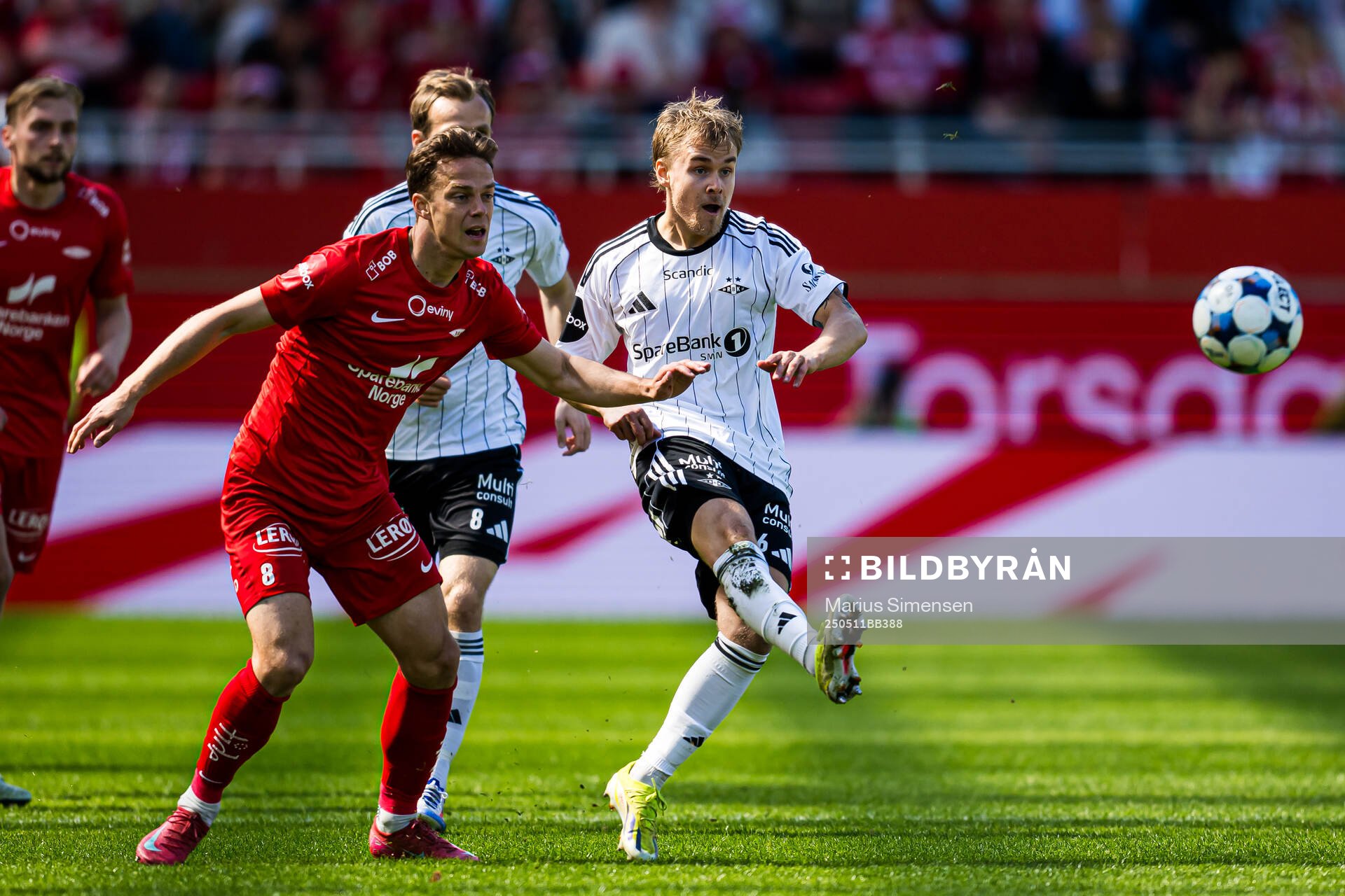 Felix Horn Myhre of Brann and Santeri Leevi Oliver Väänänen of Rosenborg during the Eliteserien match between Brann and Rosenborg on May 11, 2025 in Bergen.