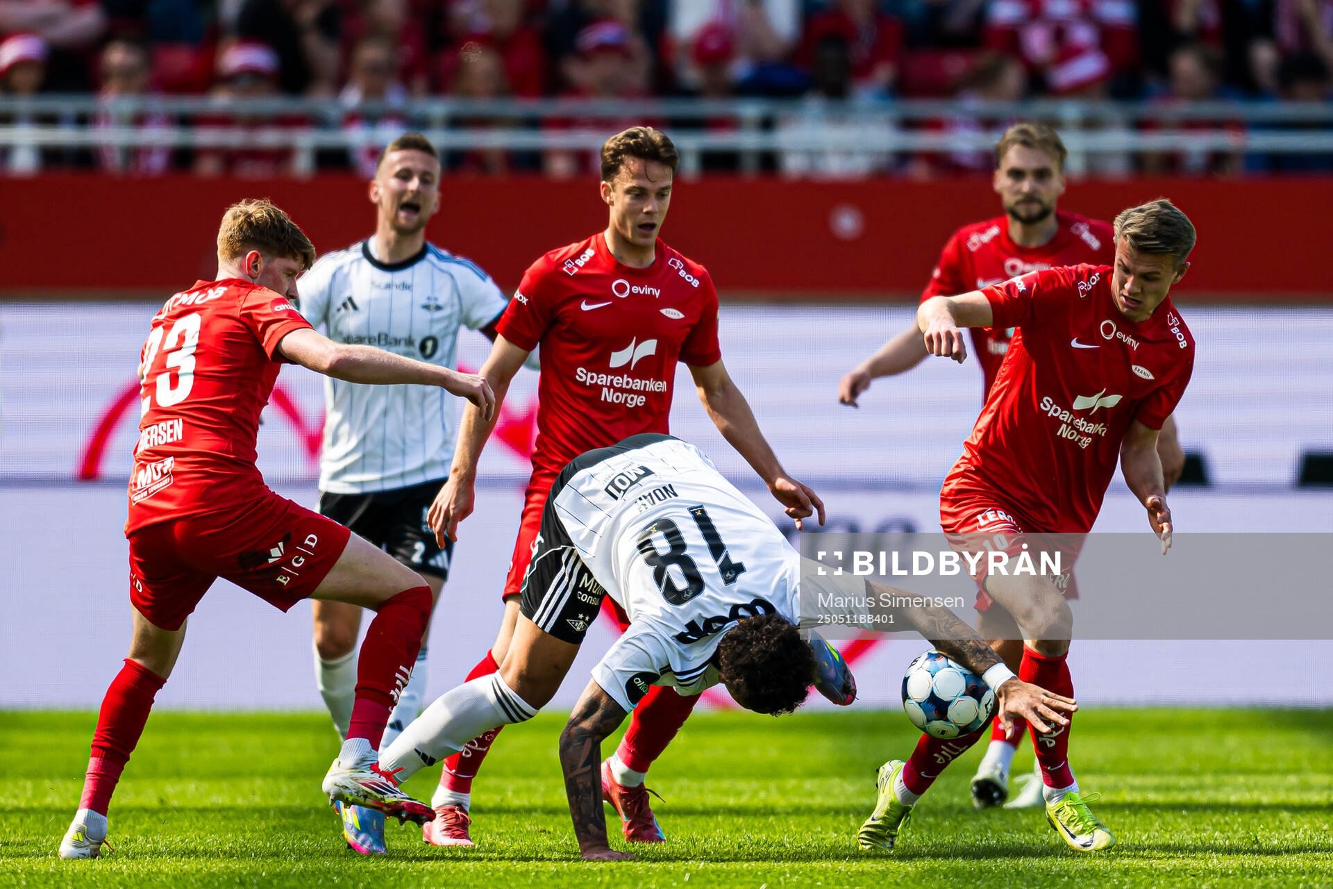 Noah Jean Holm of Rosenborg and Emil Kornvig of Brann during the Eliteserien match between Brann and Rosenborg on May 11, 2025 in Bergen.
