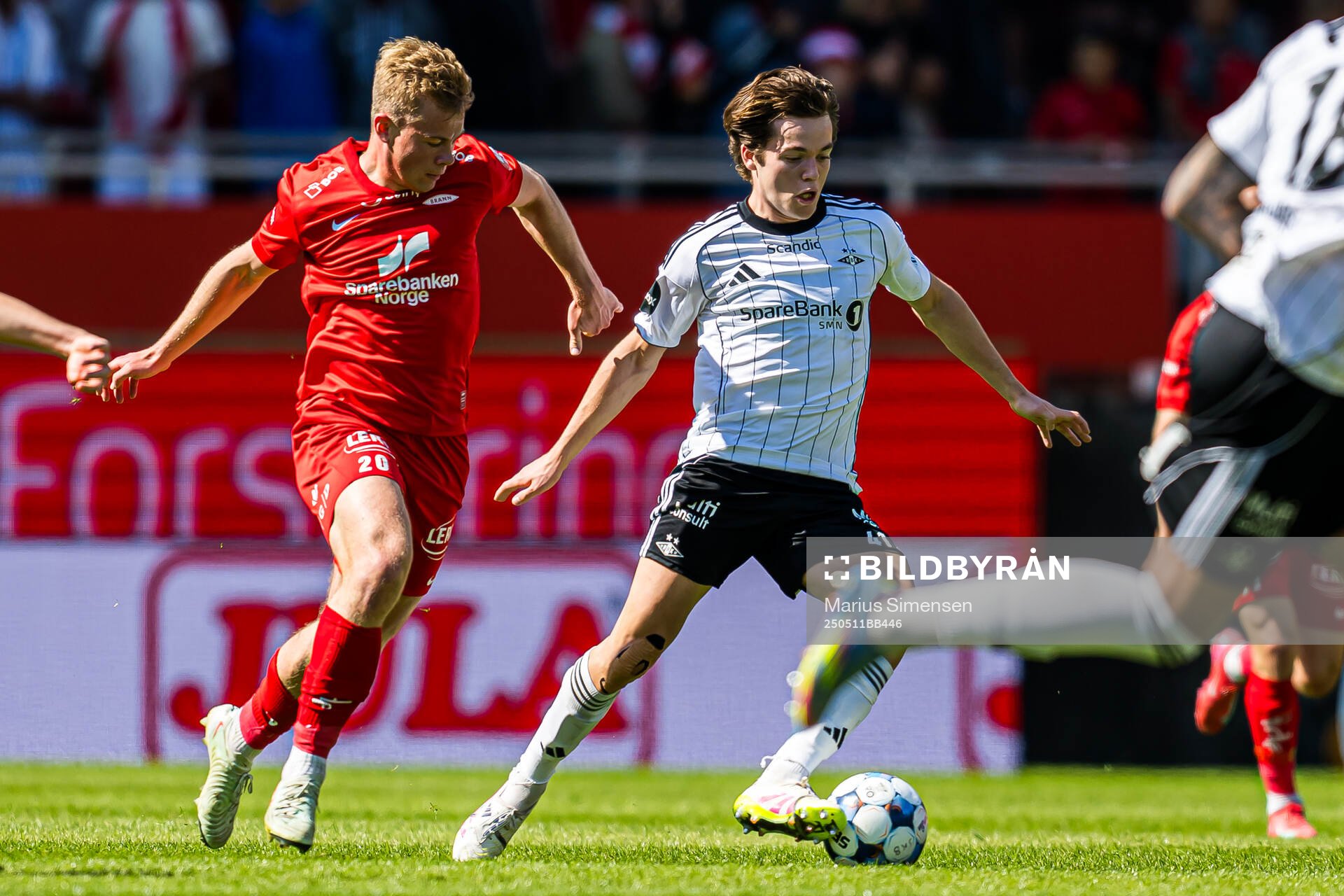 Aune Heggebø of Brann and Sverre Halseth Nypan of Rosenborg during the Eliteserien match between Brann and Rosenborg on May 11, 2025 in Bergen.