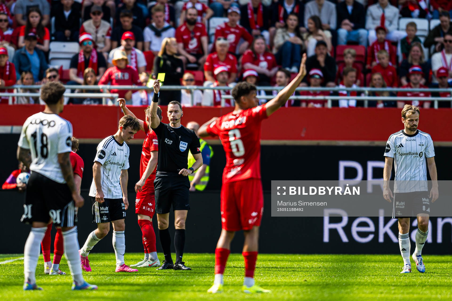 Marius Sivertsen Broholm of Rosenborg after receiving a yellow card by Marius Hansen Grøtta, referee, during the Eliteserien match between Brann and Rosenborg on May 11, 2025 in Bergen.