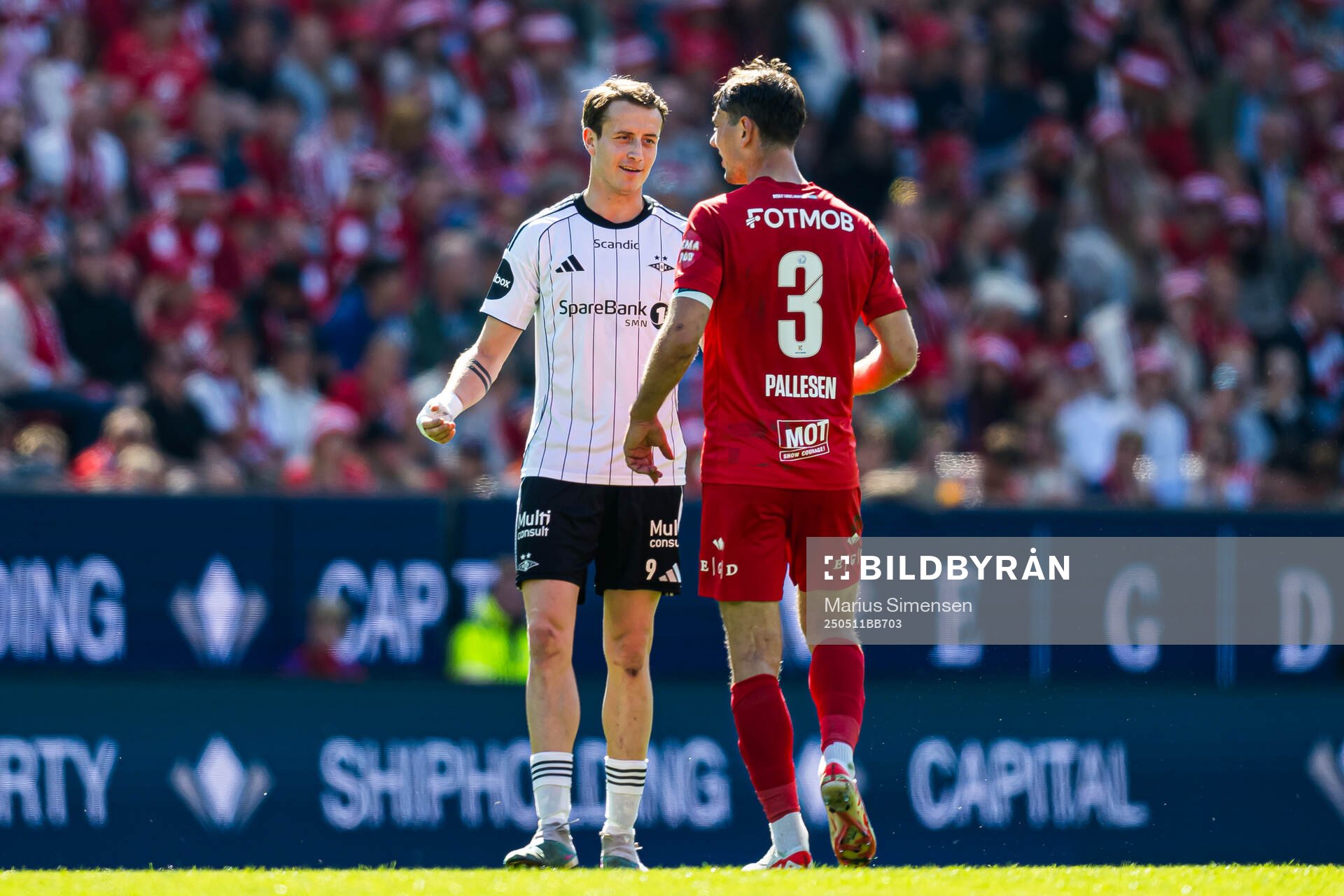 Ole Sæter of Rosenborg and Fredrik Pallesen Knudsen of Brann during the Eliteserien match between Brann and Rosenborg on May 11, 2025 in Bergen.
