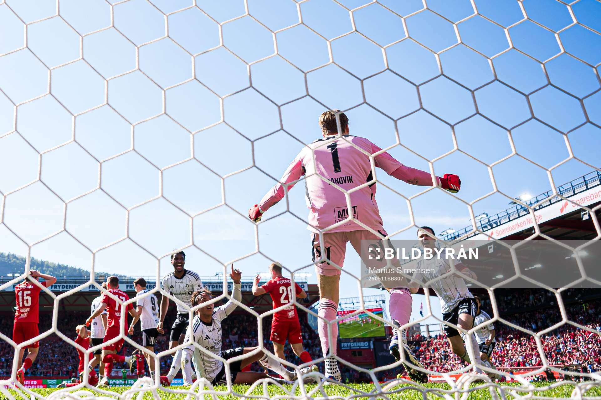 Sander Tangvik and Ole Kristian Selnæs of Rosenborg celebrates after a save during the Eliteserien match between Brann and Rosenborg on May 11, 2025 in Bergen.