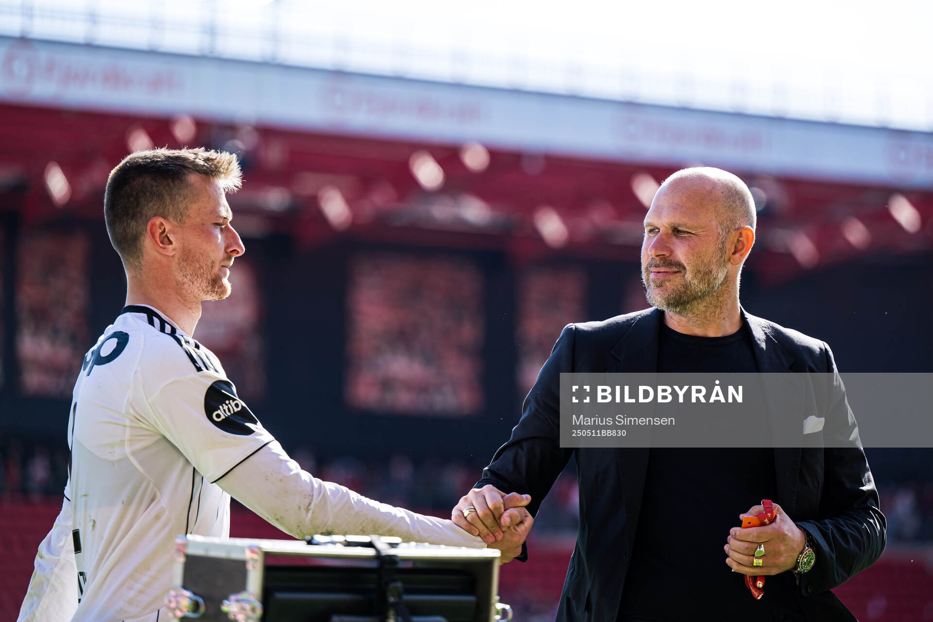 Erlend Dahl Reitan of Rosenborg and Mikael Dorsin, sports director of Rosenborg, after the Eliteserien match between Brann and Rosenborg on May 11, 2025 in Bergen.