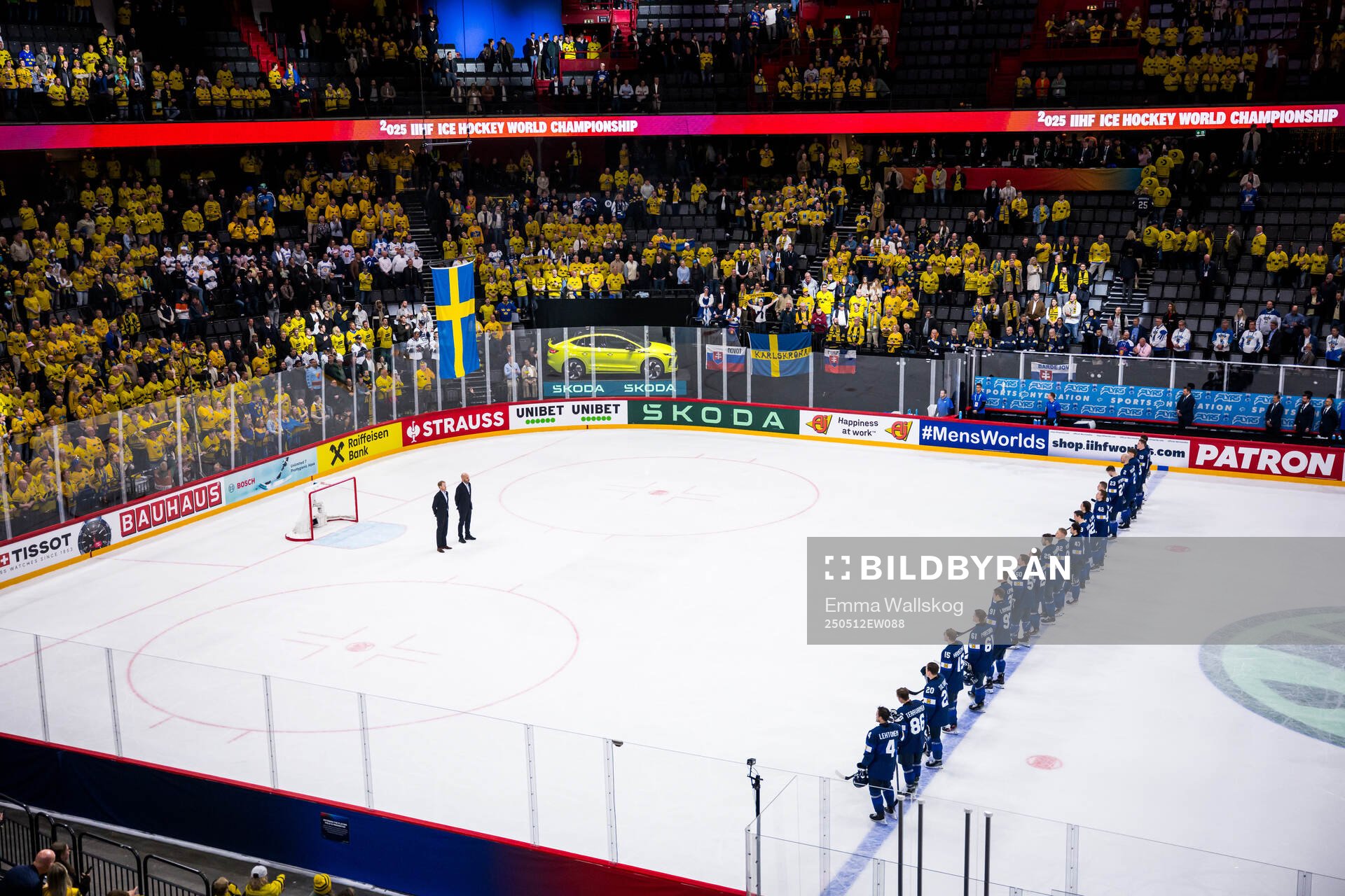 Players of Finland as the Swedish flag is raised