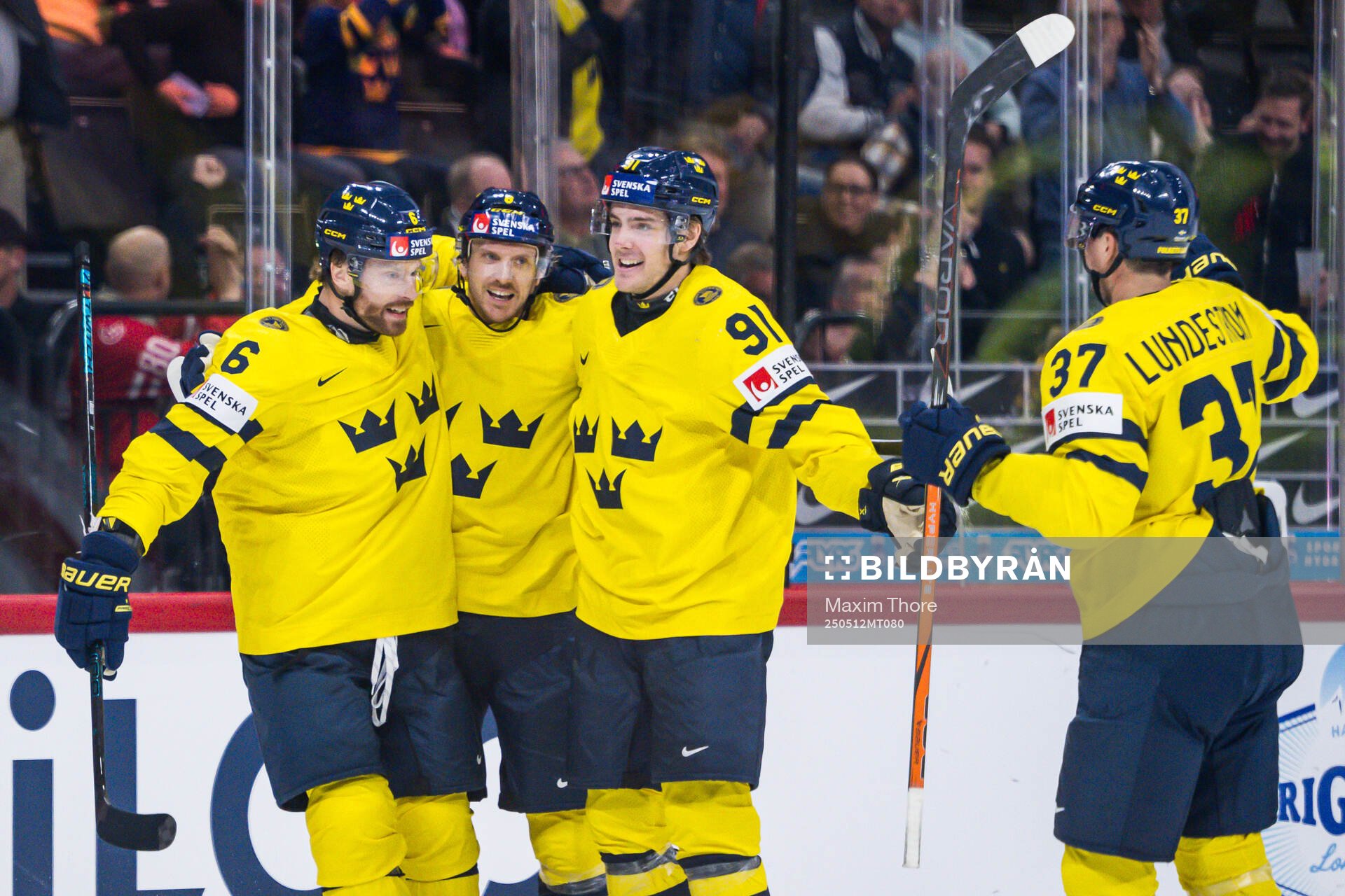 Adam Larsson, Leo Carlsson and Isac Lundeström celebrate