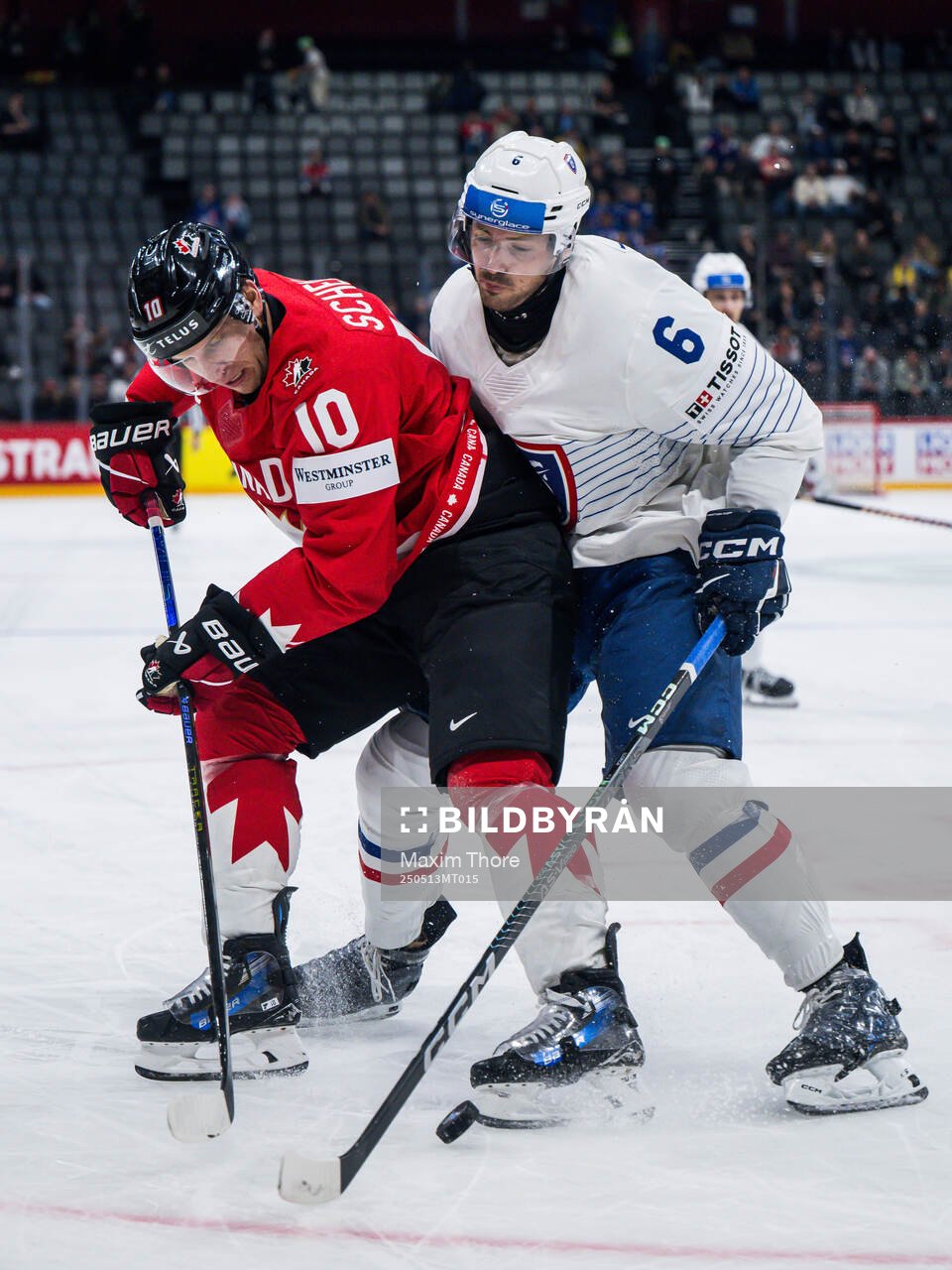 Brayden Schenn of Canada and Vincent Llorca of France