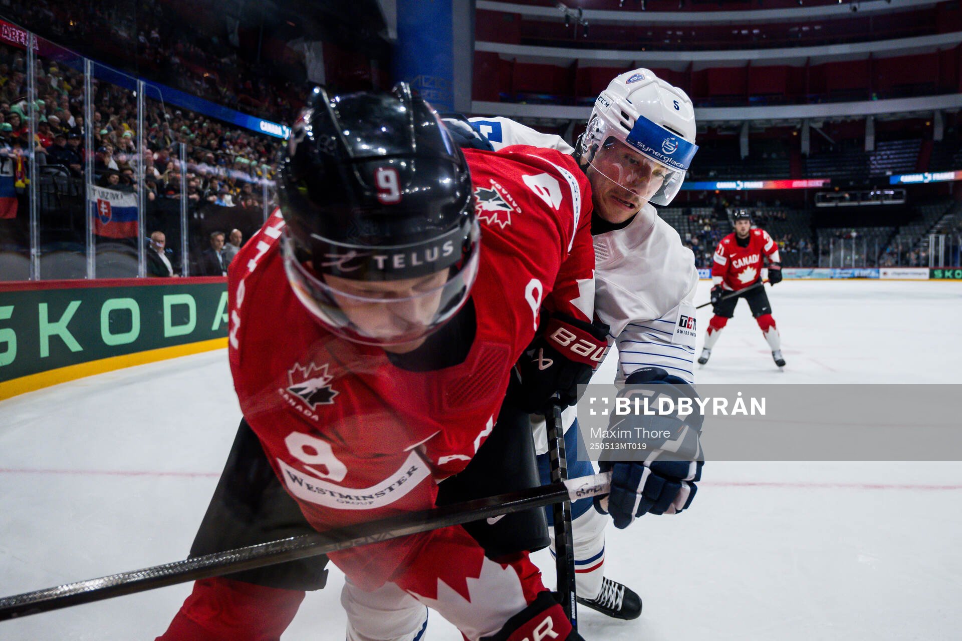 Nathan MacKinnon of Canada and Enzo Guebey of France
