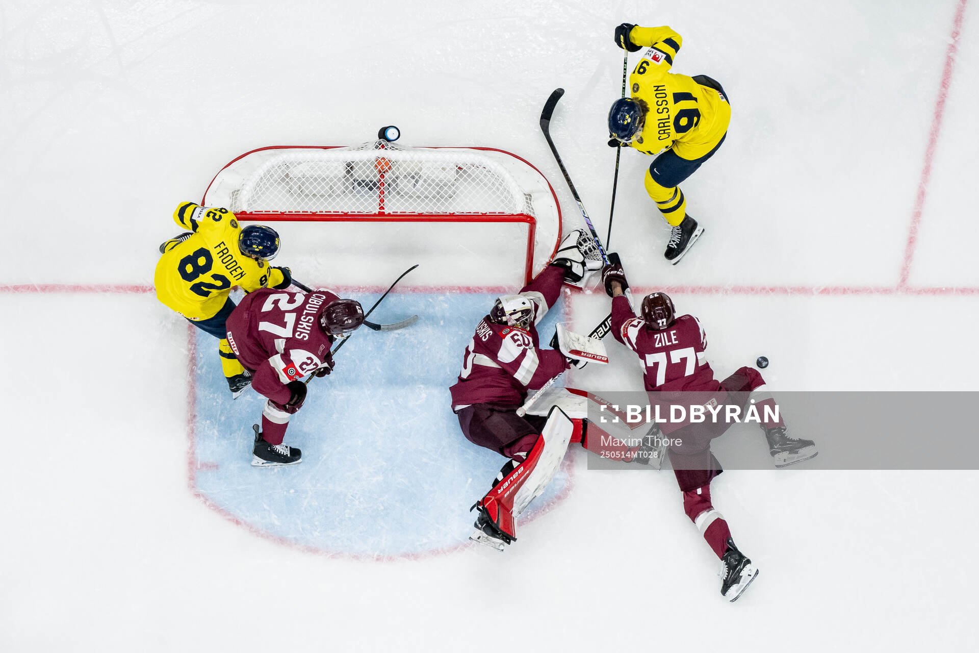 Jesper Frödén and Leo Carlsson of Sweden against Oskars