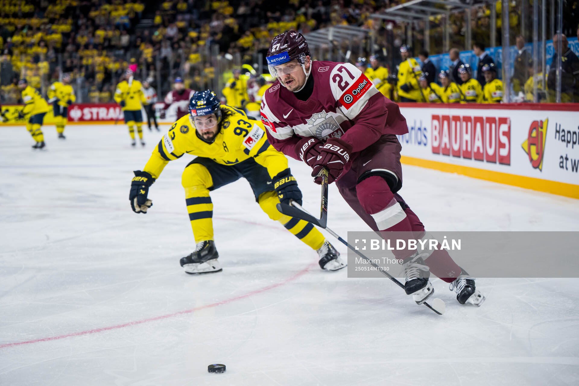 Mika Zibanejad of Sweden and Oskars Cibulskis of Latvia