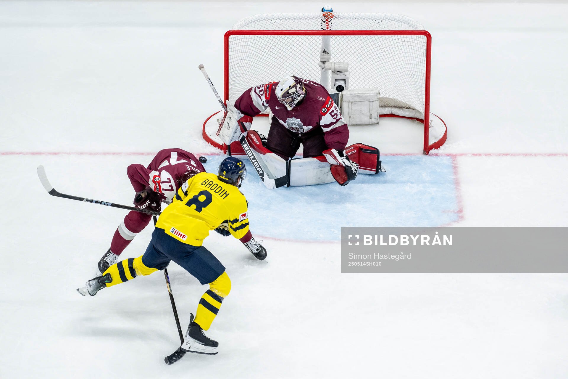 Jonas Brodin of Sweden against Kristaps Roberts Zile and