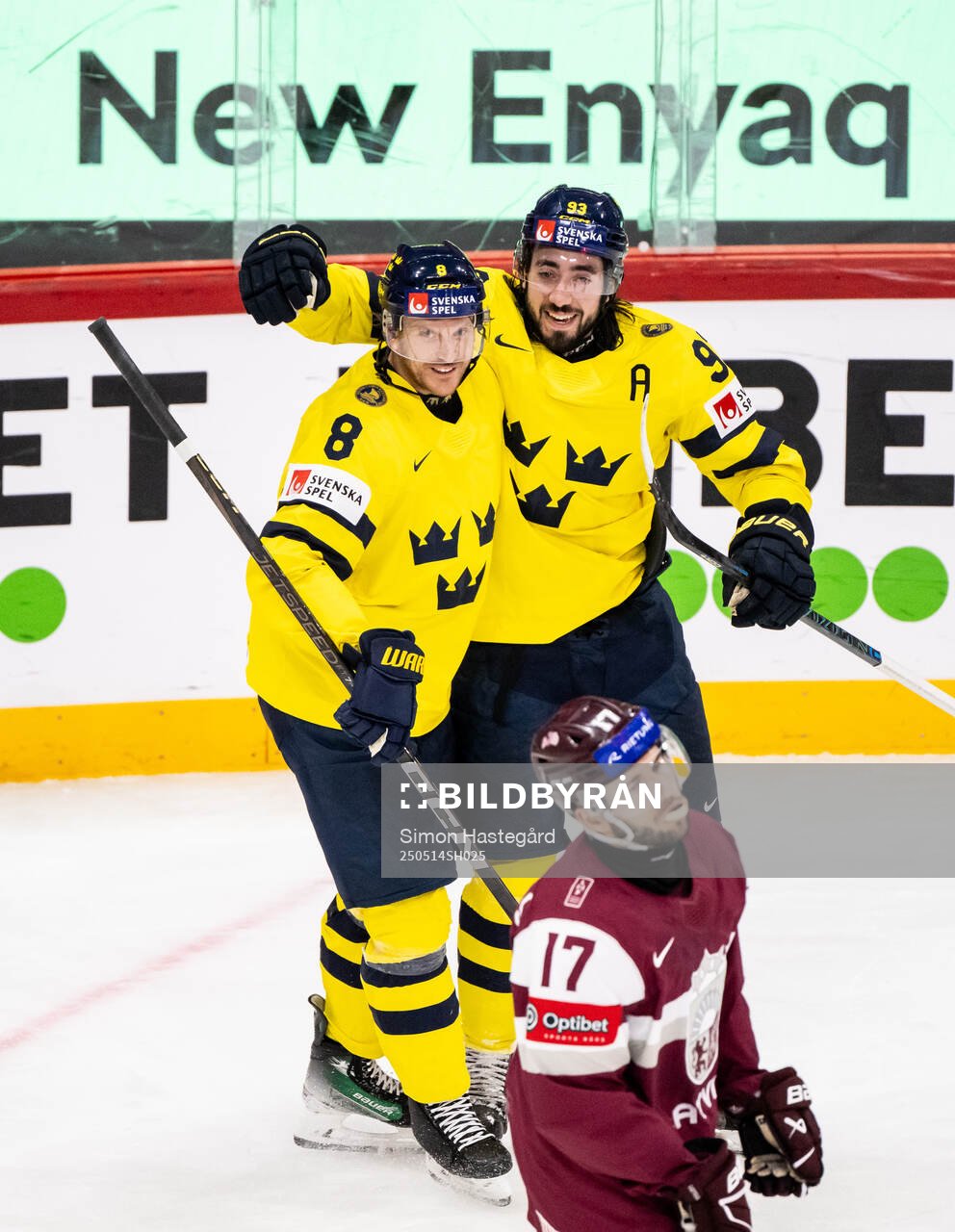 Jonas Brodin and Mika Zibanejad of Sweden celebrate
