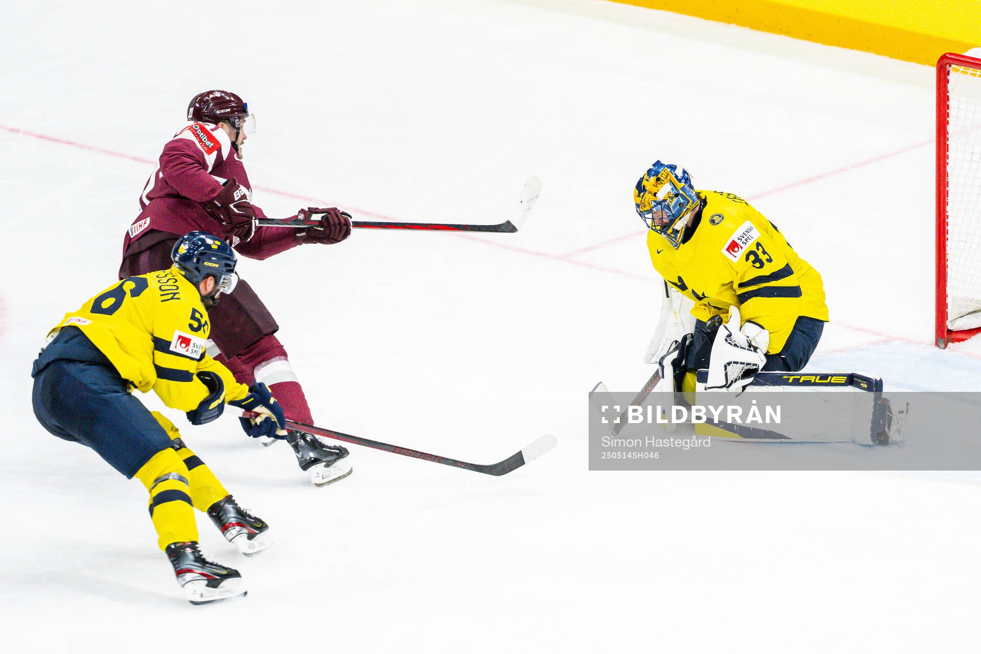 Rudolfs Balcers of Latvia against goaltender Samuel Ersson