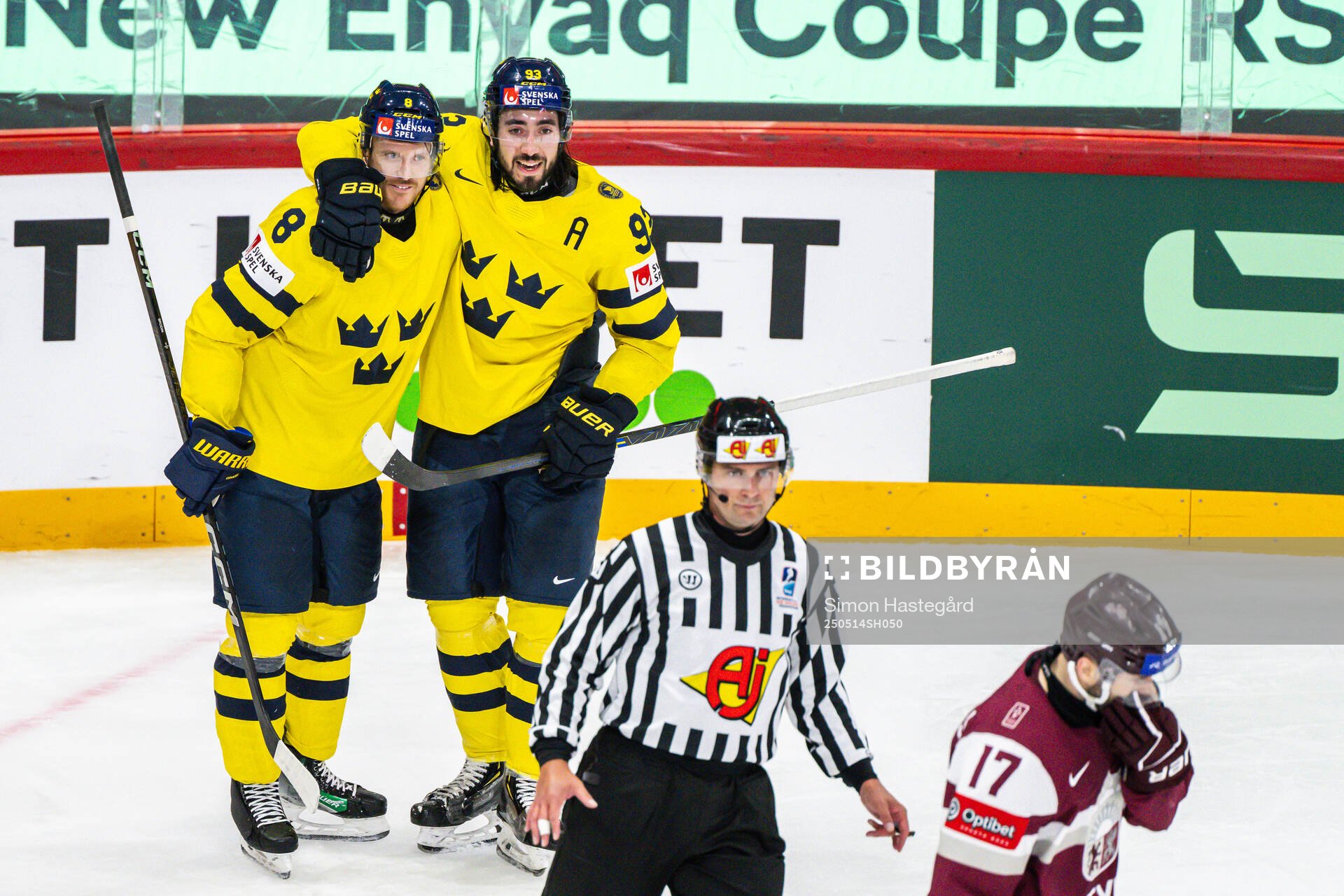 Jonas Brodin and Mika Zibanejad of Sweden celebrate the 0-5
