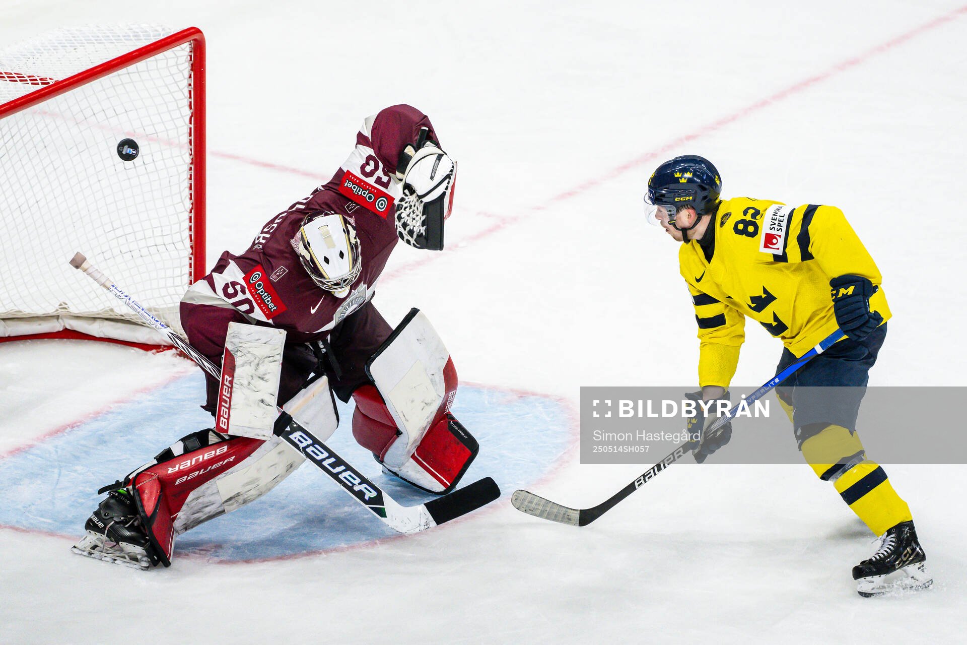Jesper Frödén of Sweden against goalkeeper Kristers