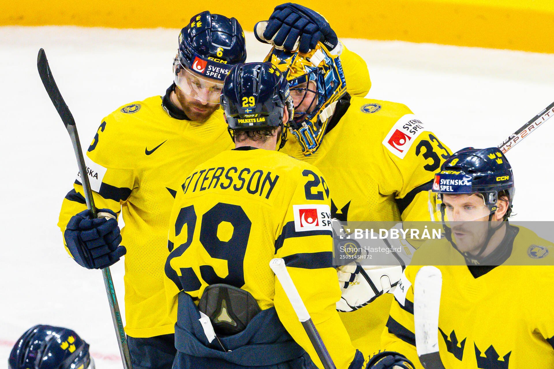 Marcus Pettersson and goaltender Samuel Ersson of Sweden