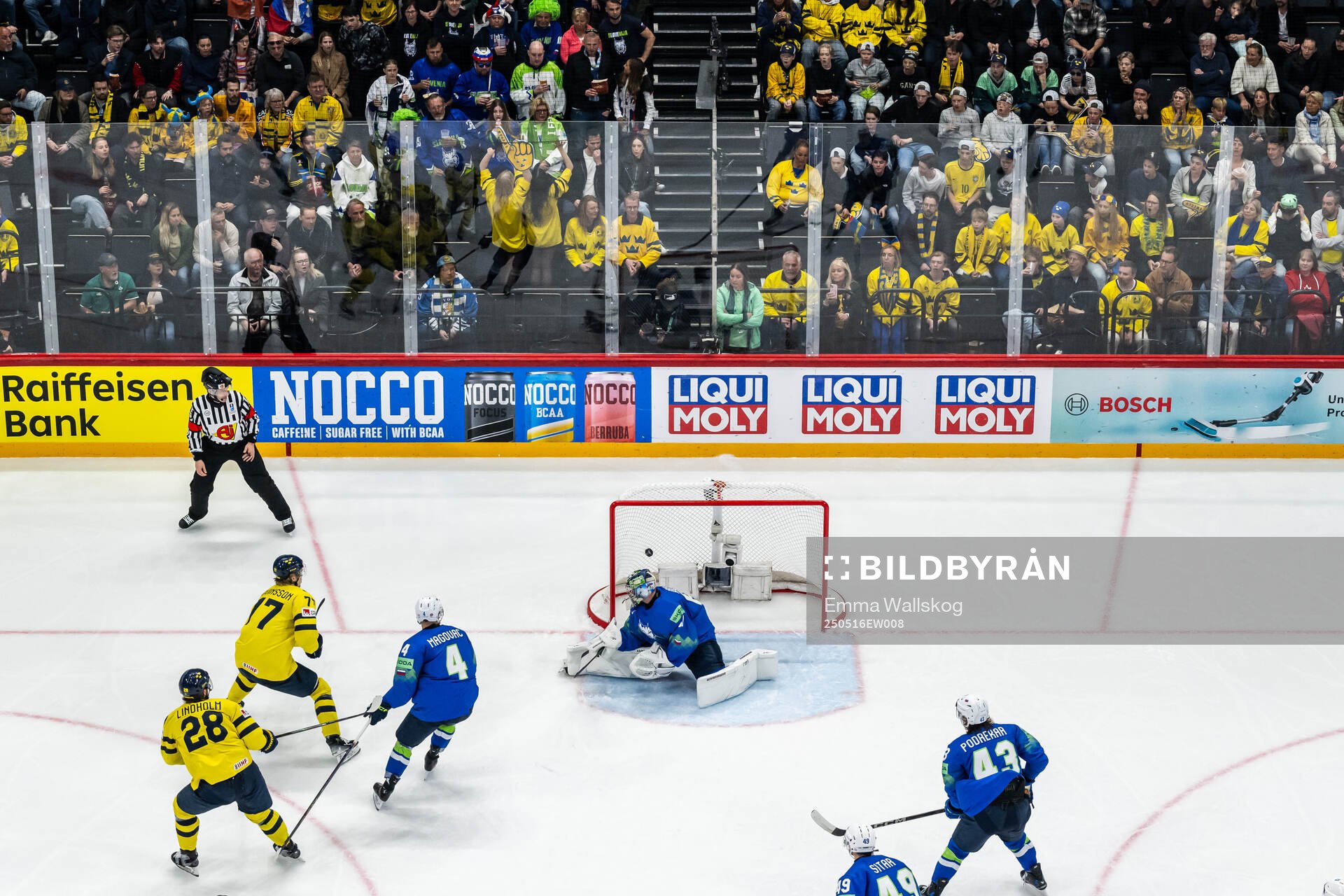 Elias Lindholm of Sweden scores the 1-0 goal behind