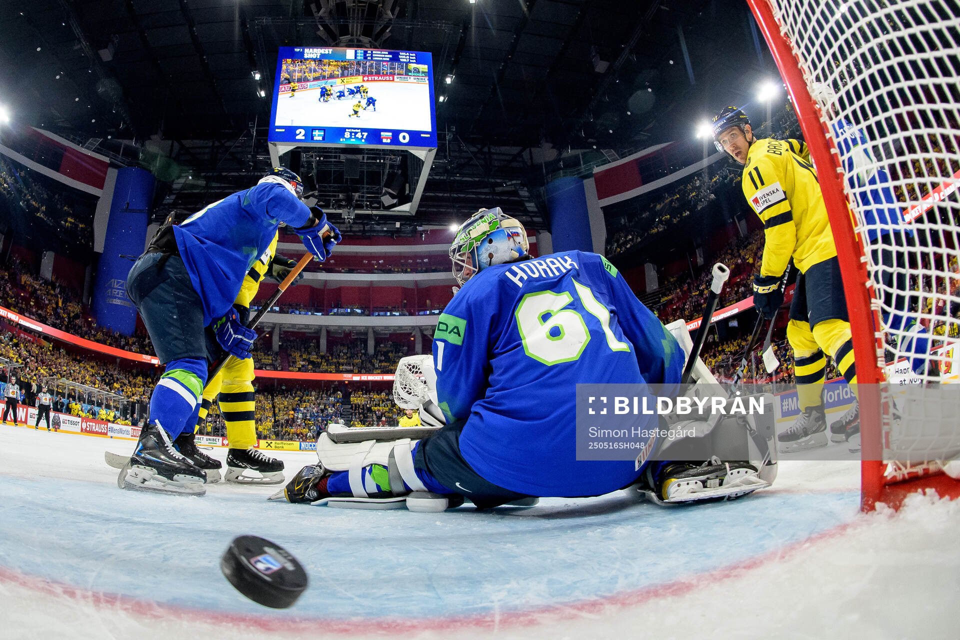 Elias Lindholm of Sweden,  not pictured, scores the 3-0