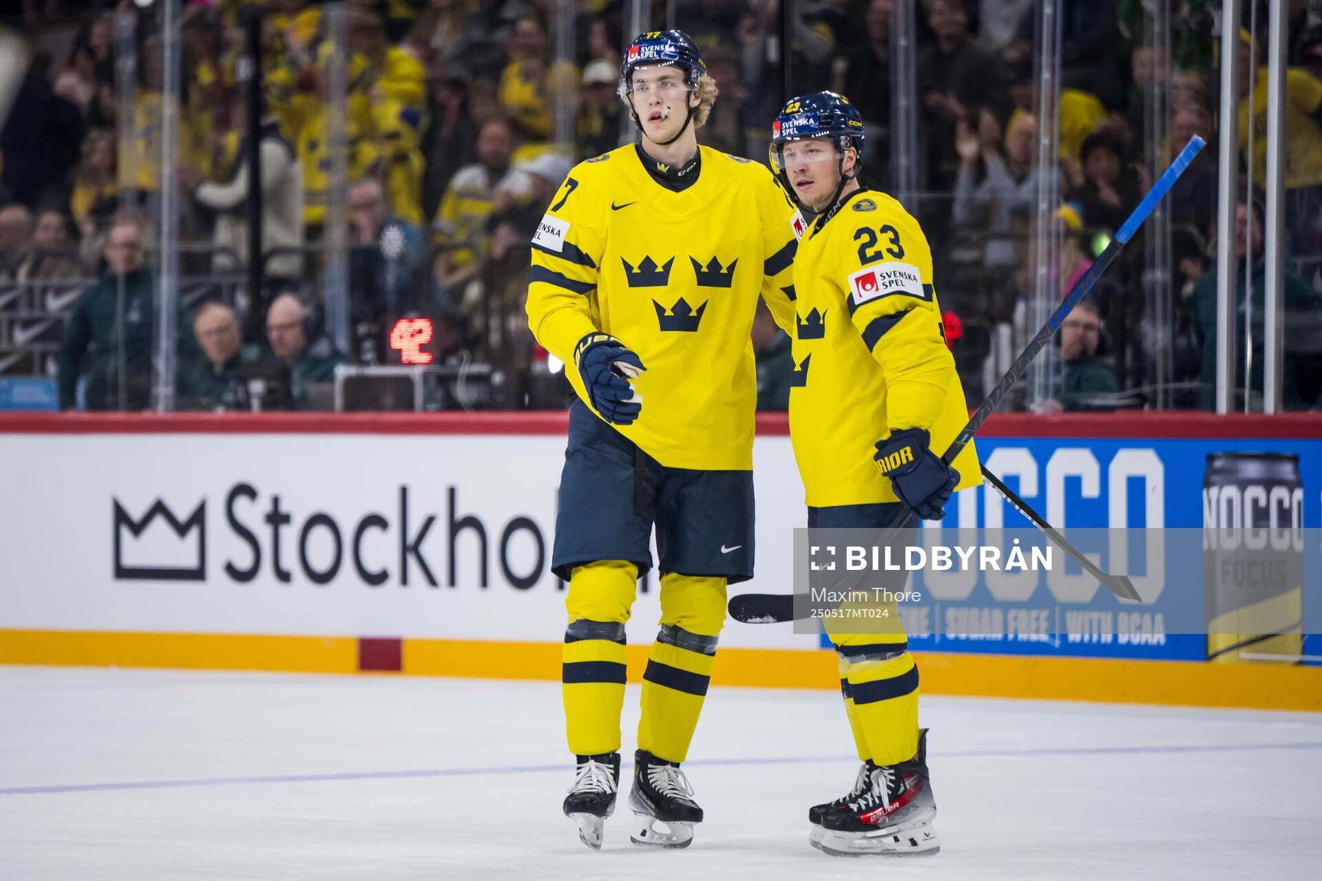Simon Edvinsson and Lucas Raymond of Sweden celebrate