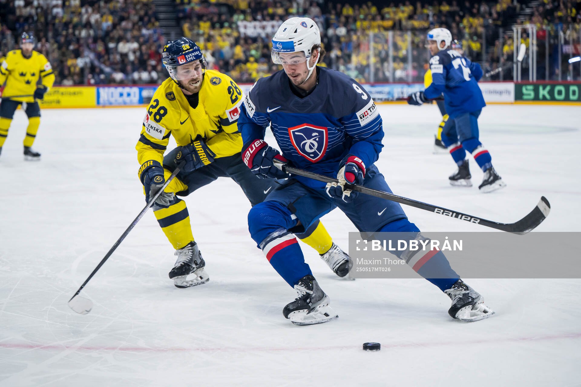 Elias Lindholm of Sweden and Alexandre Texier of France