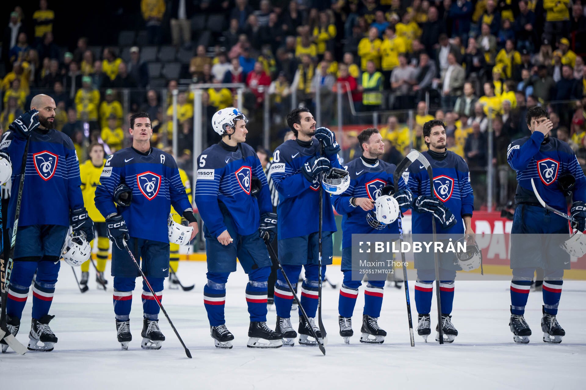 Players of France look dejected