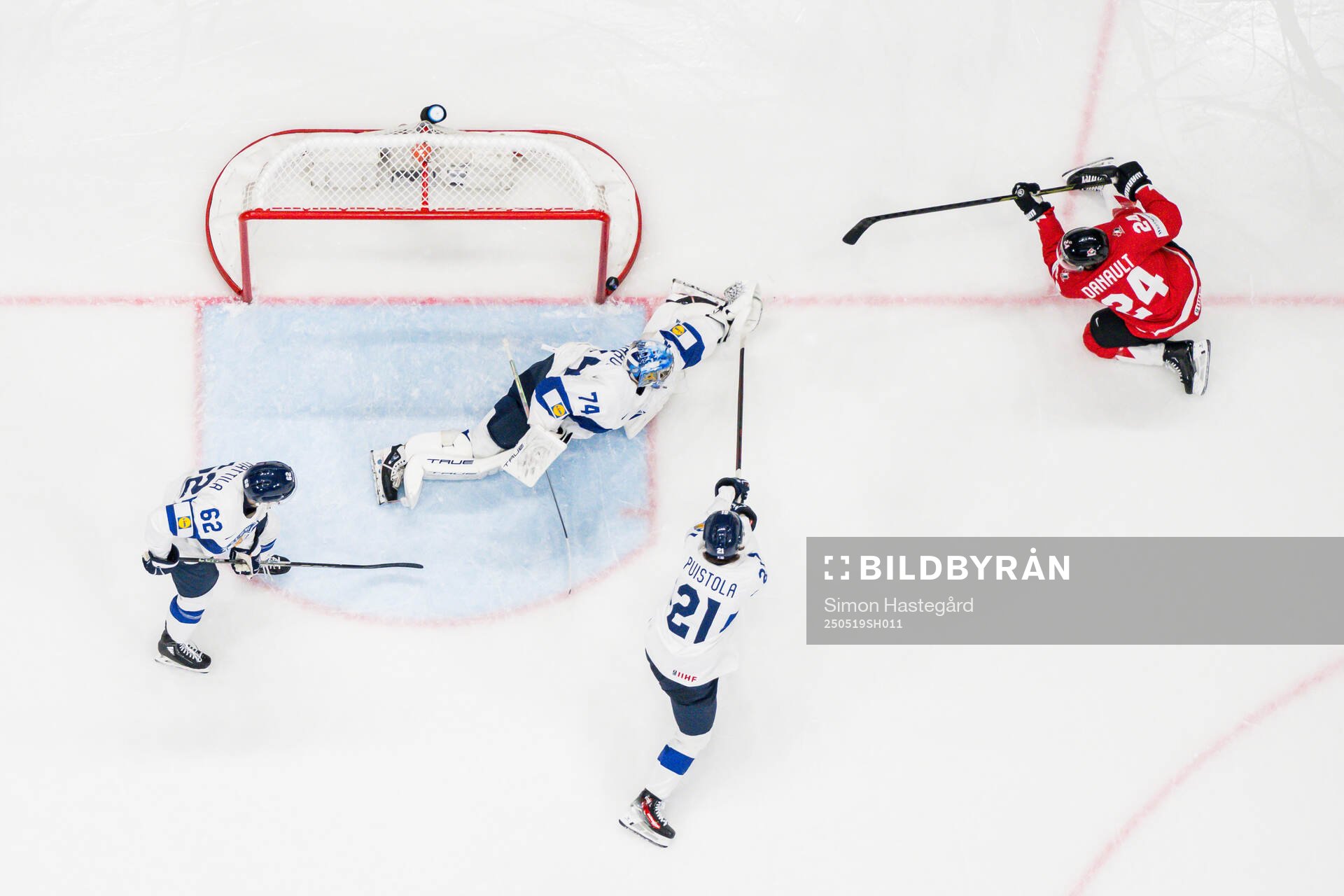 goaltender Juuse Saros and Patrik Puistola of Finland