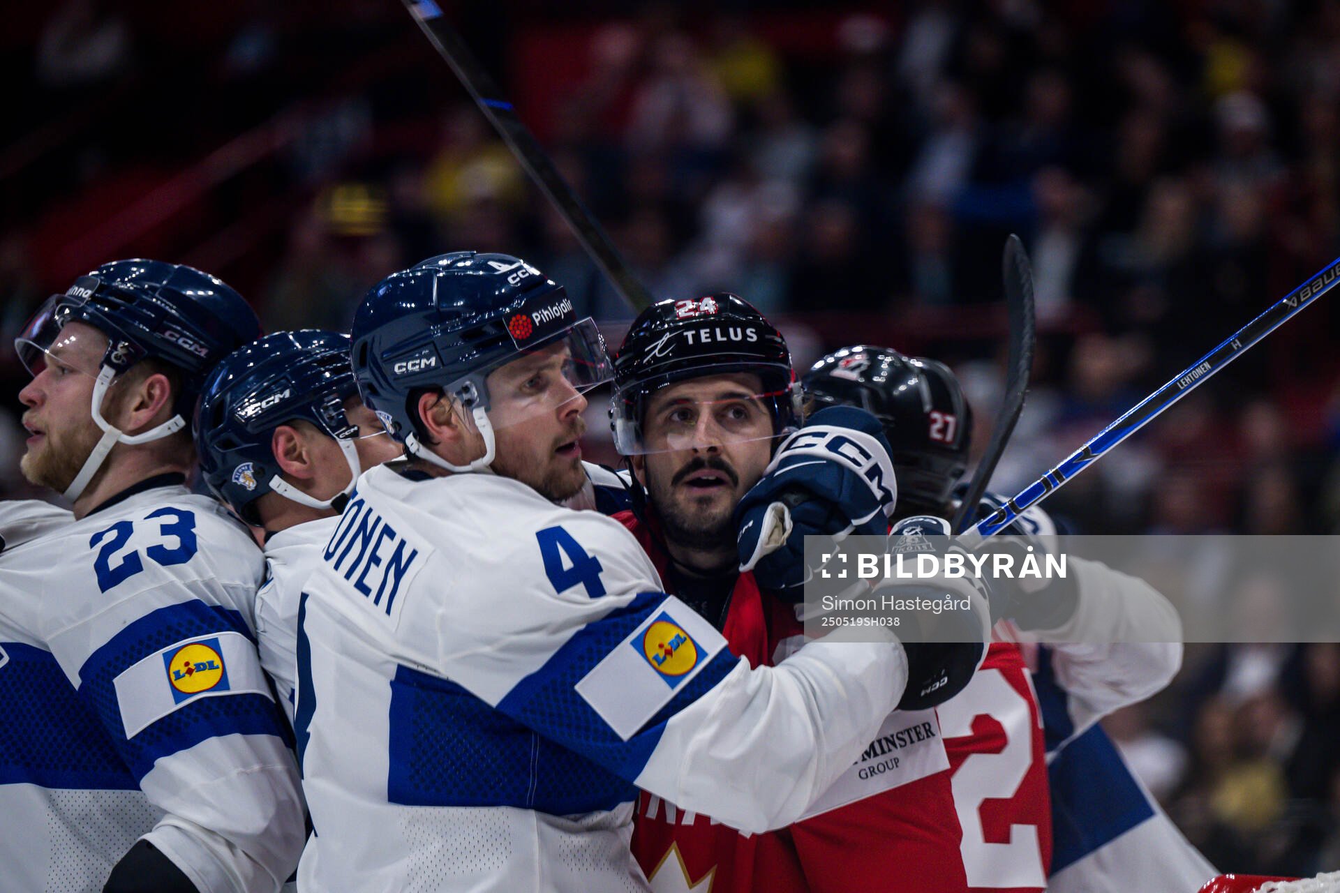 Mikko Lehtonen of Finland and Phillip Danault of Canada