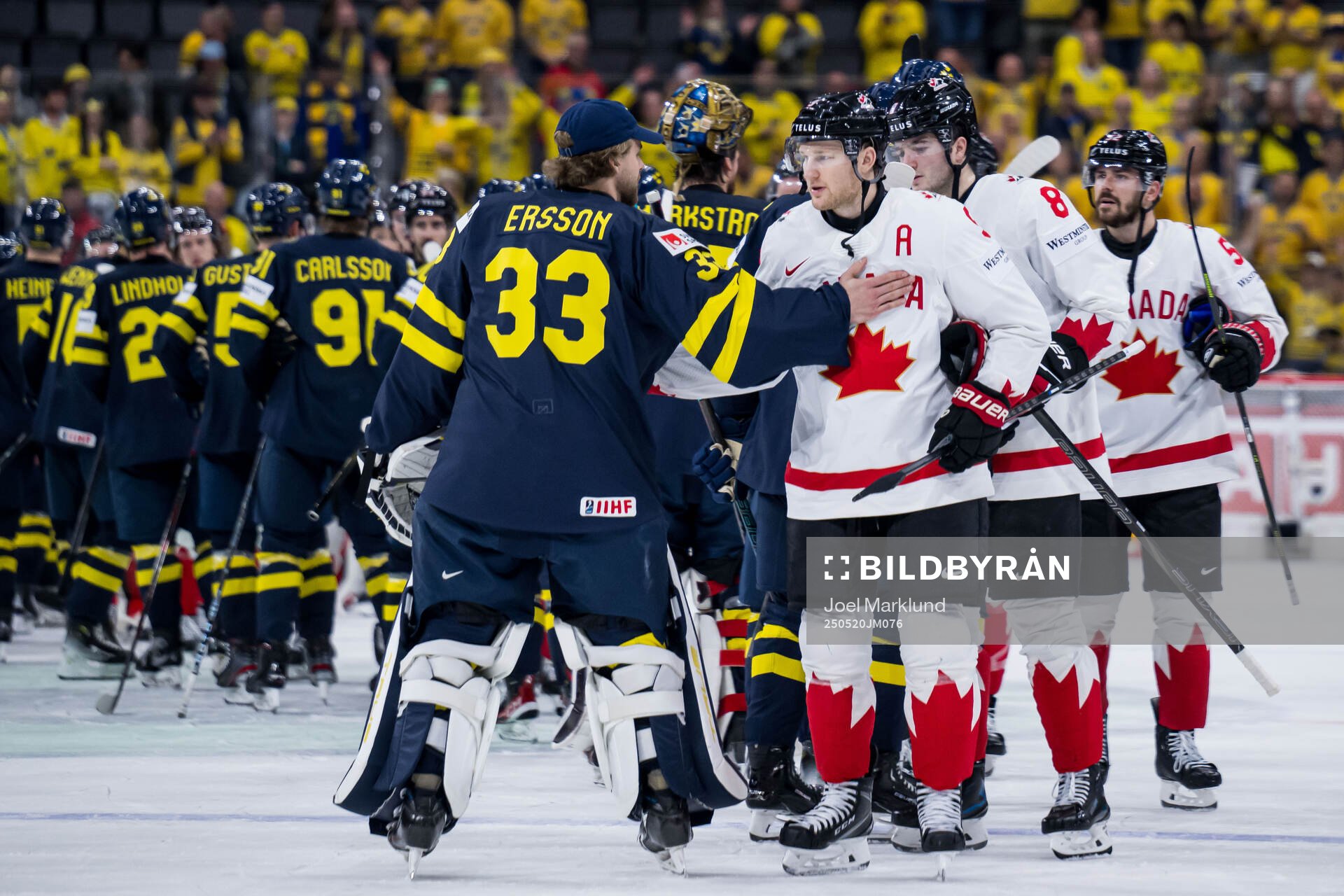 Goaltender Samuel Ersson of Sweden and Nathan MacKinnon of