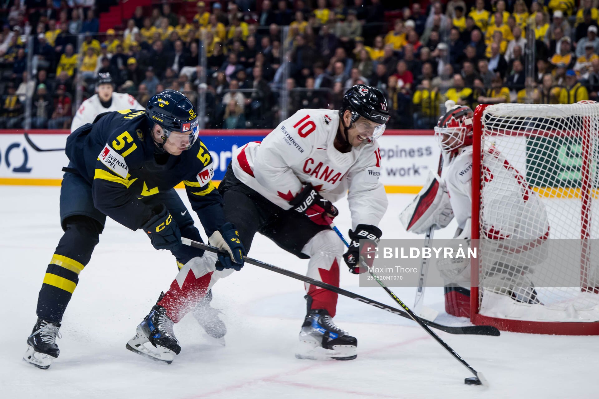 Emil Heineman of Sweden and Brayden Schenn of Canada