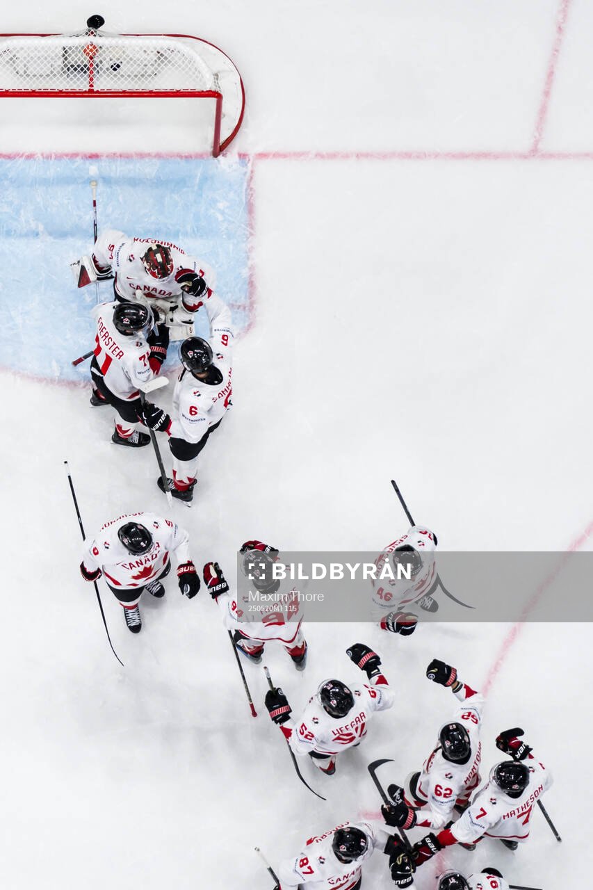 Goaltender Jordan Binnington of Canada celebrate with