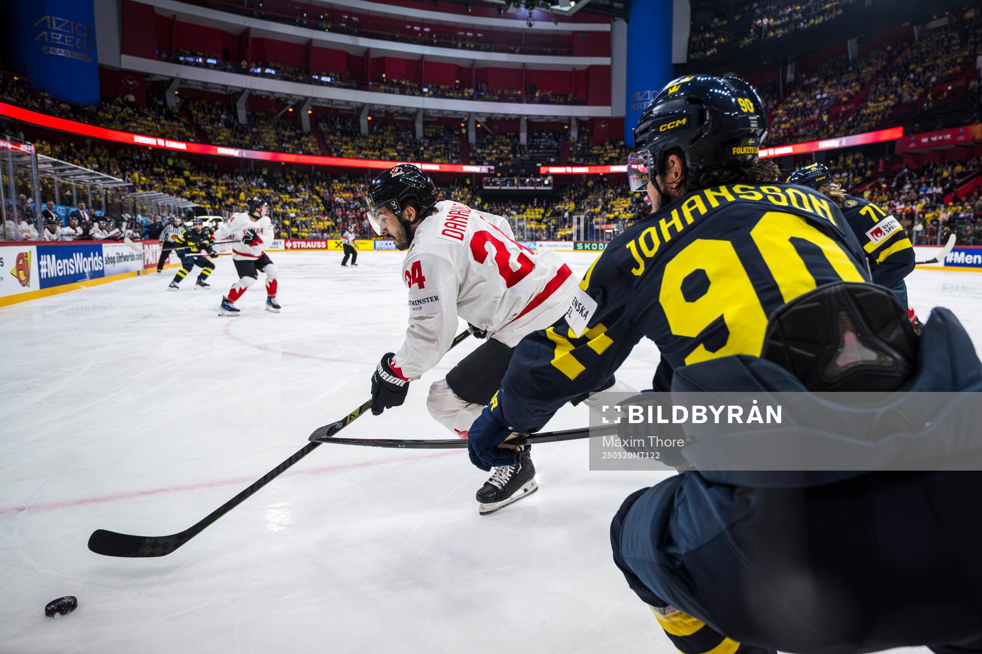 Phillip Danault of Canada and Marcus Johansson of Sweden