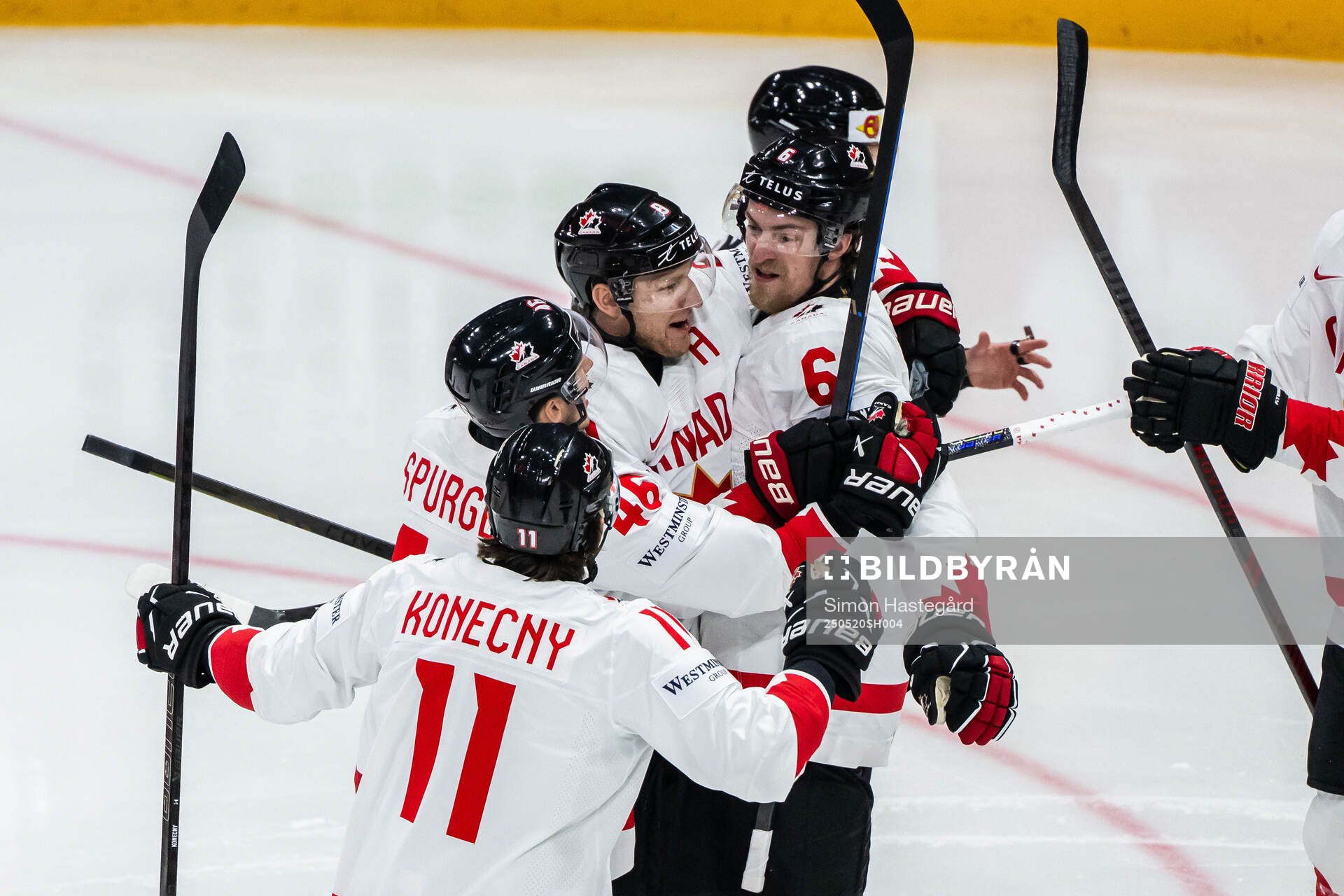 Nathan MacKinnon and Travis Sanheim of Canada celebrate