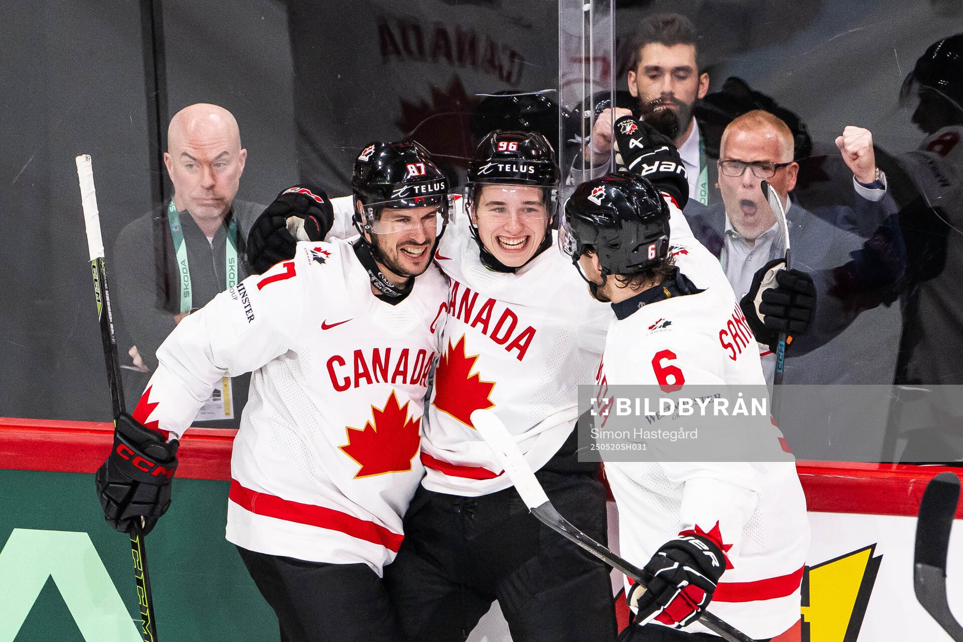 Sidney Crosby , Macklin Celebrini and Travis Sanheim of