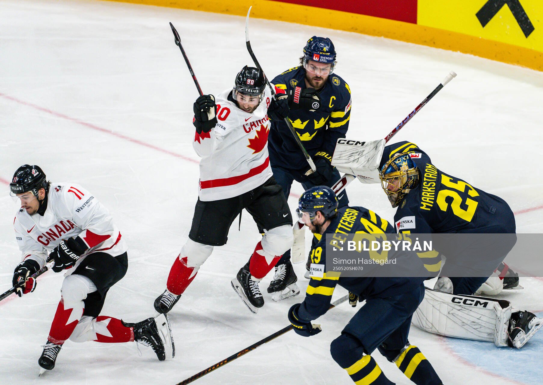 Brayden Schenn of Canada and Rasmus Andersson of Sweden