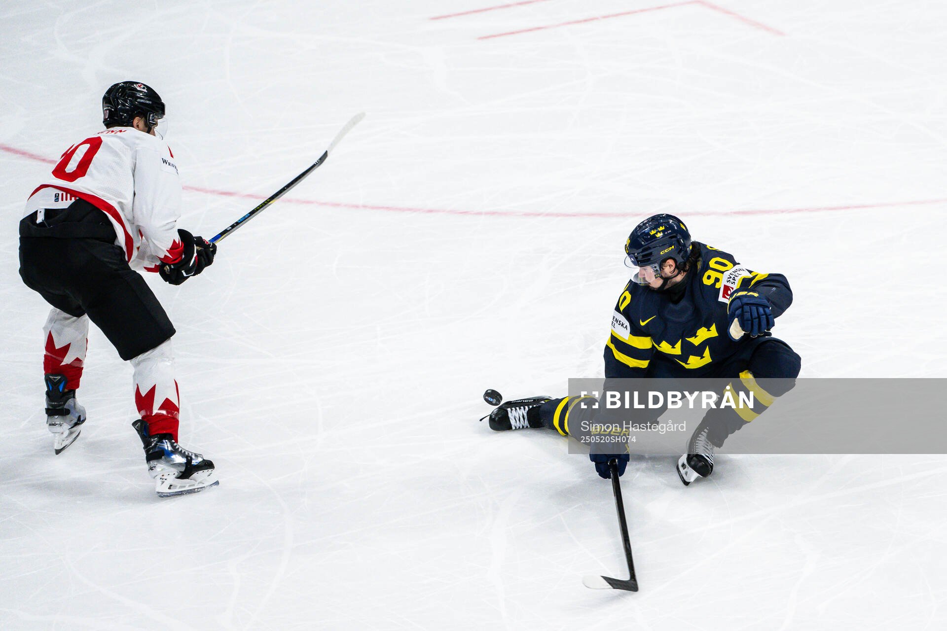 Brayden Schenn of Canada and Marcus Johansson of Sweden