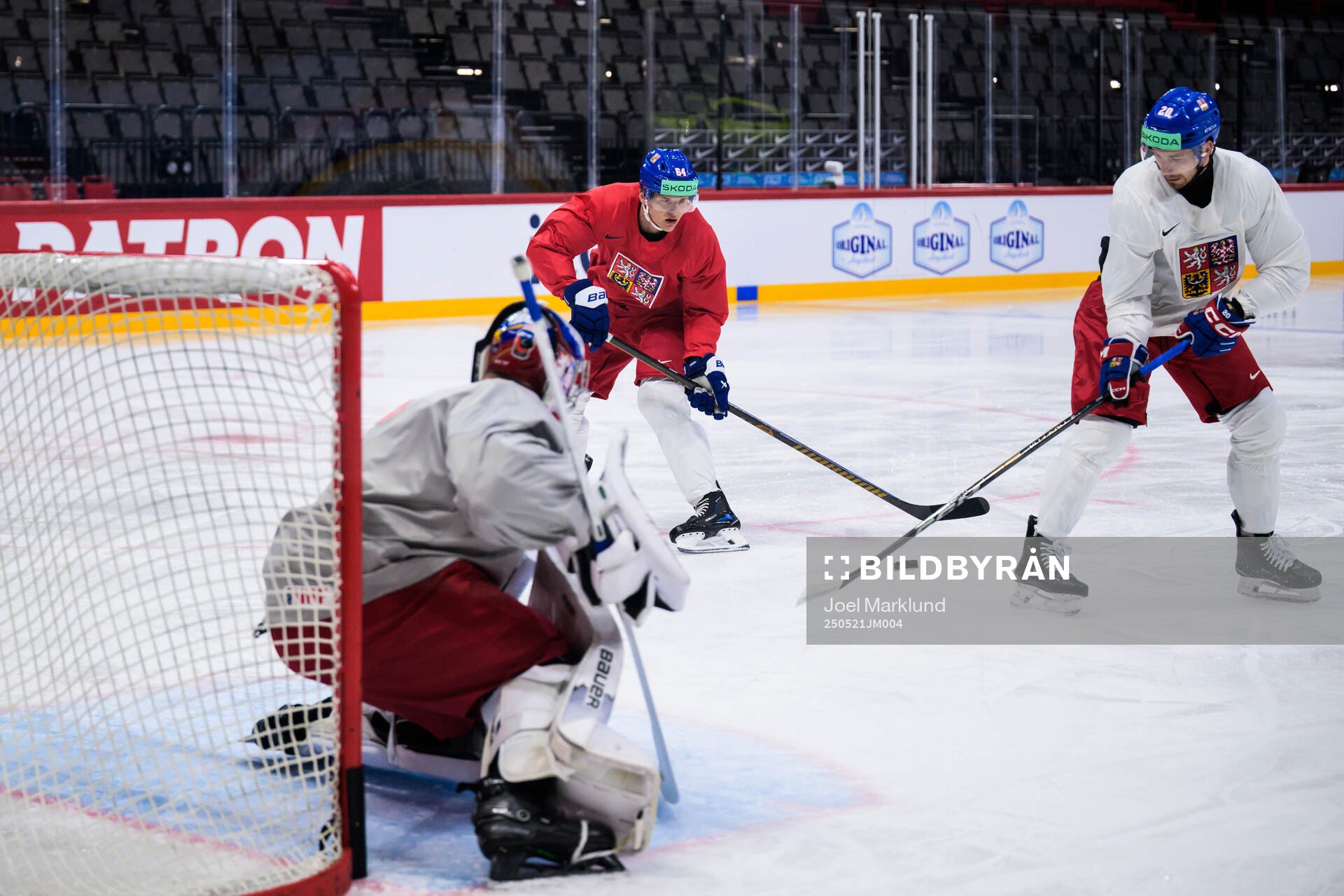 Goaltender Josef Korenar, David Kampf and Daniel Gazda of
