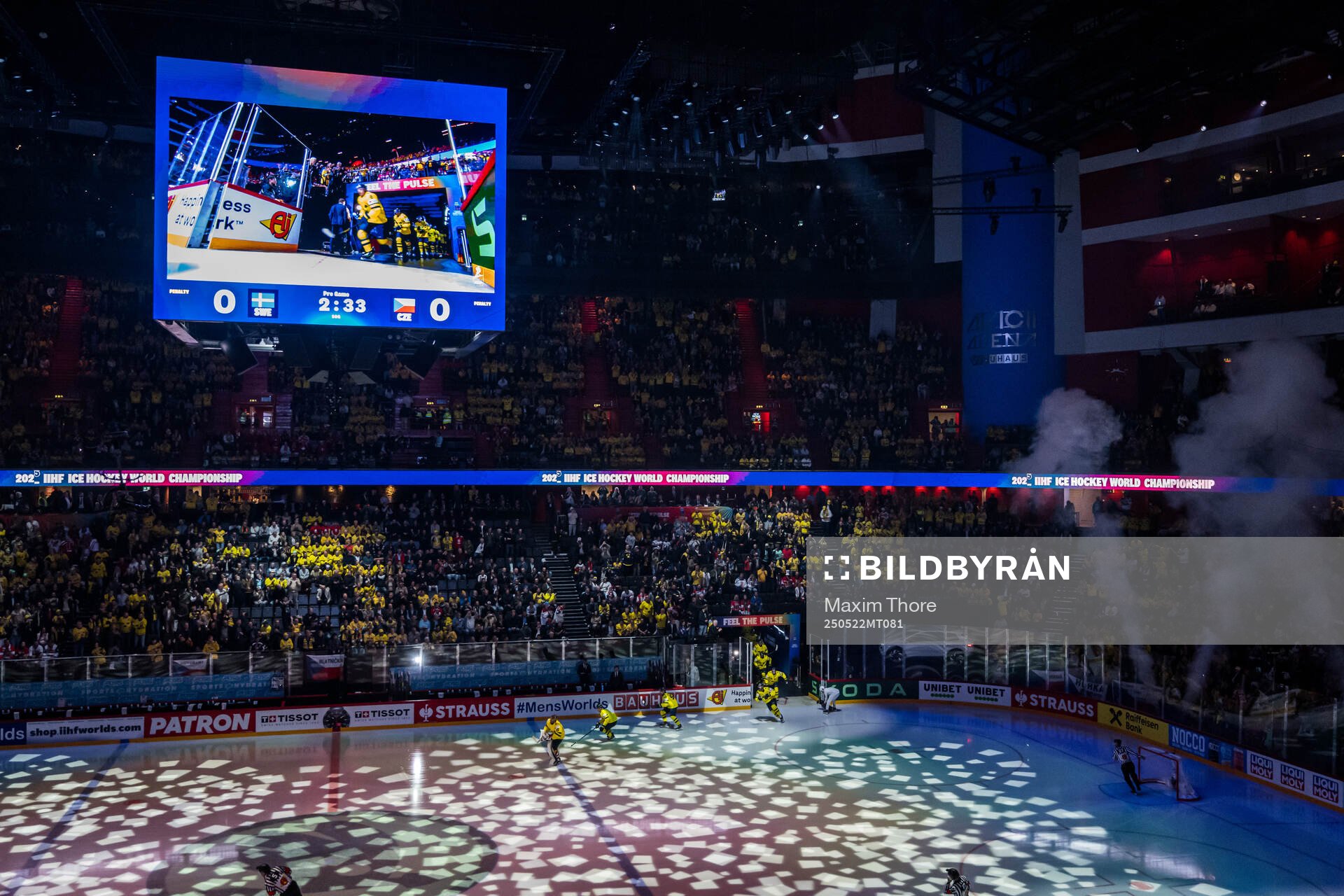 Players of Sweden enter the ice