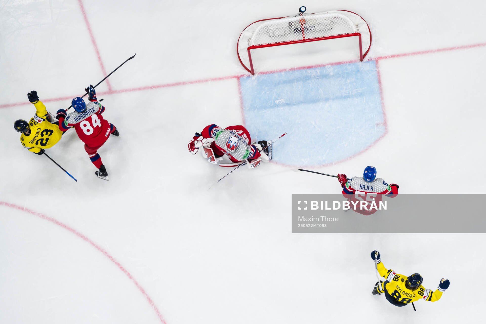 Lucas Raymond and William Nylander of Sweden celebrate the