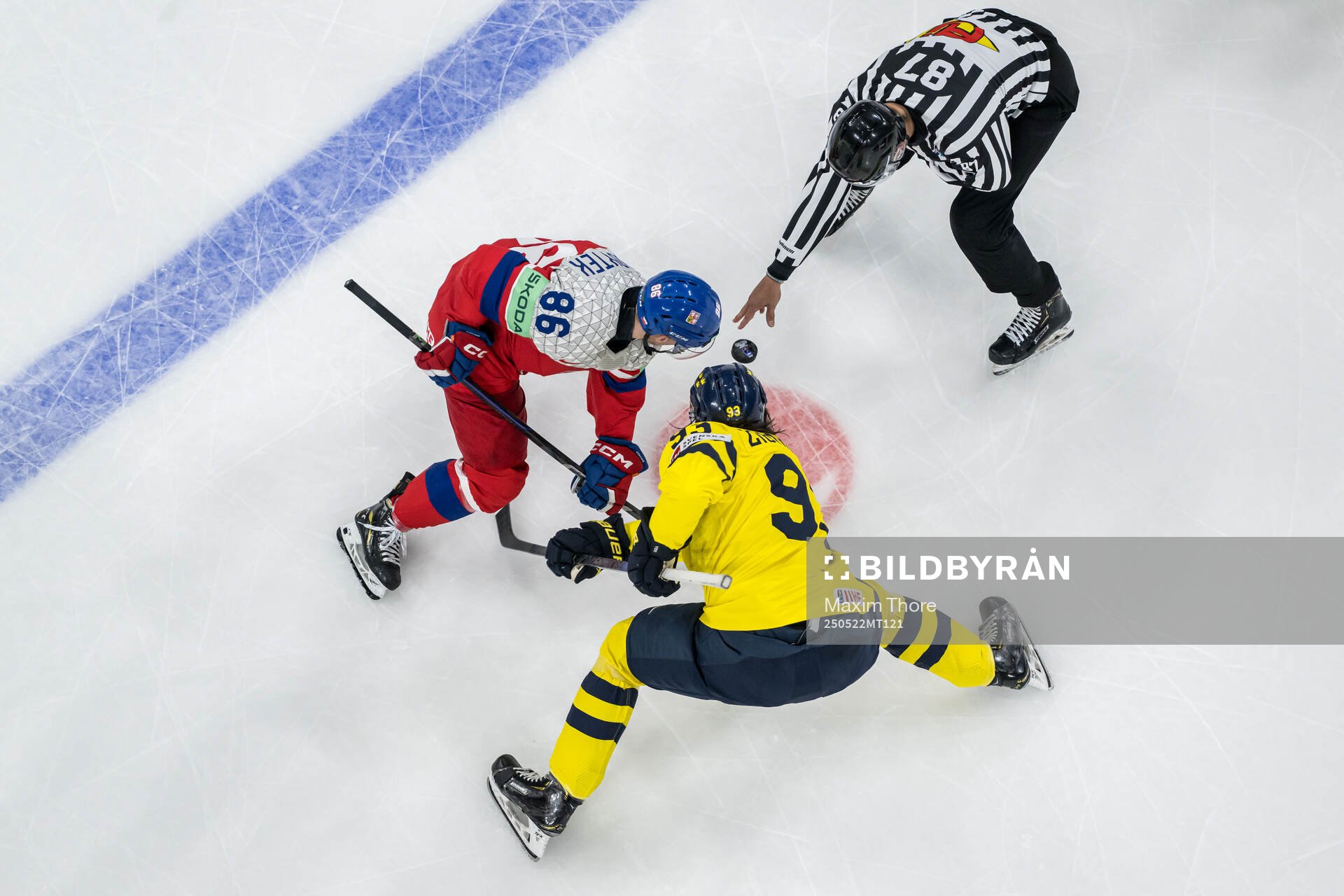 Petr Kodytek of Czech Republic and Mika Zibanejad of Sweden