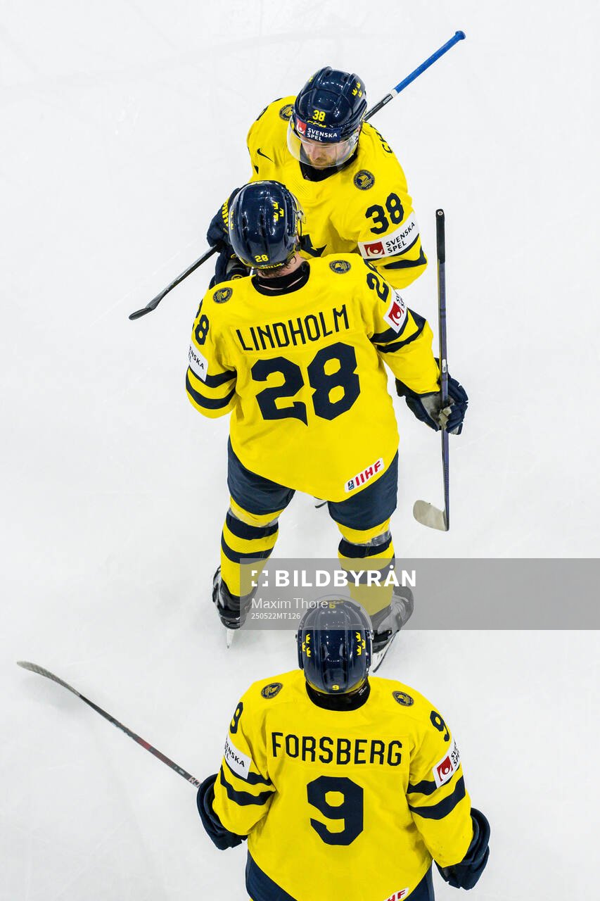 Rasmus Sandin, Elias Lindholm, and Filip Forsberg of Sweden