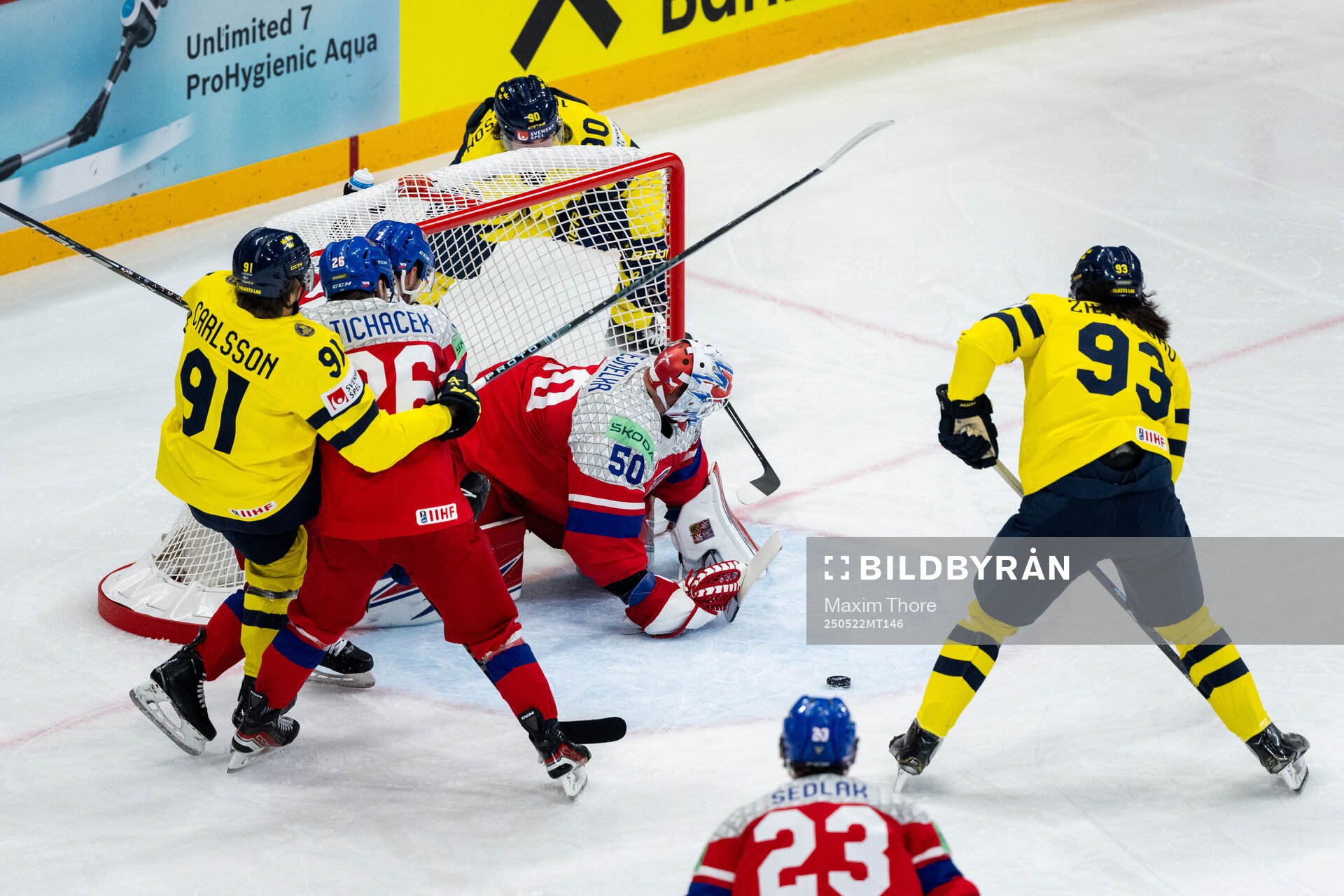 Leo Carlsson and Mika Zibanejad of Sweden as well as Karel