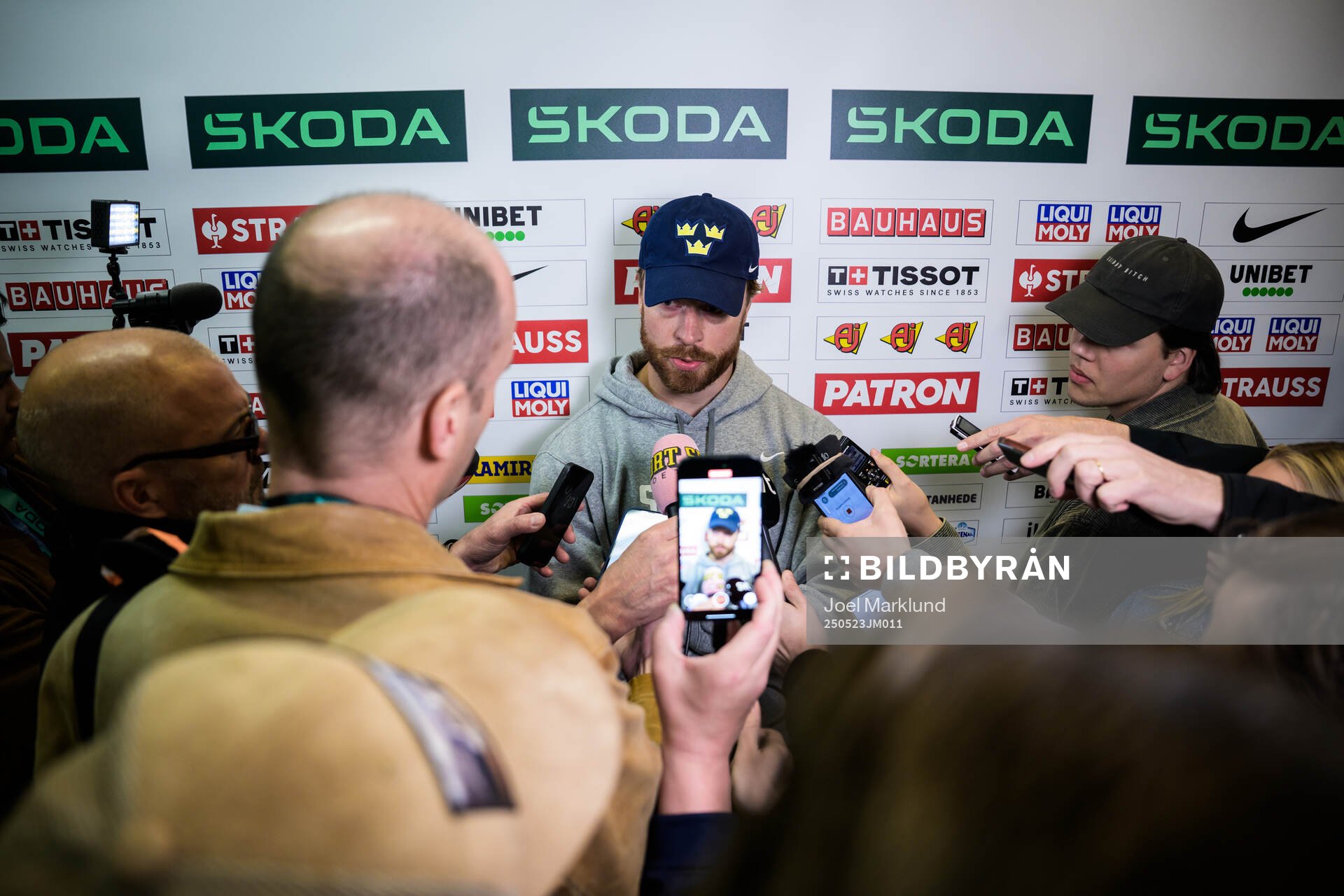 Adam Larsson of Sweden is being interviewed by media at a