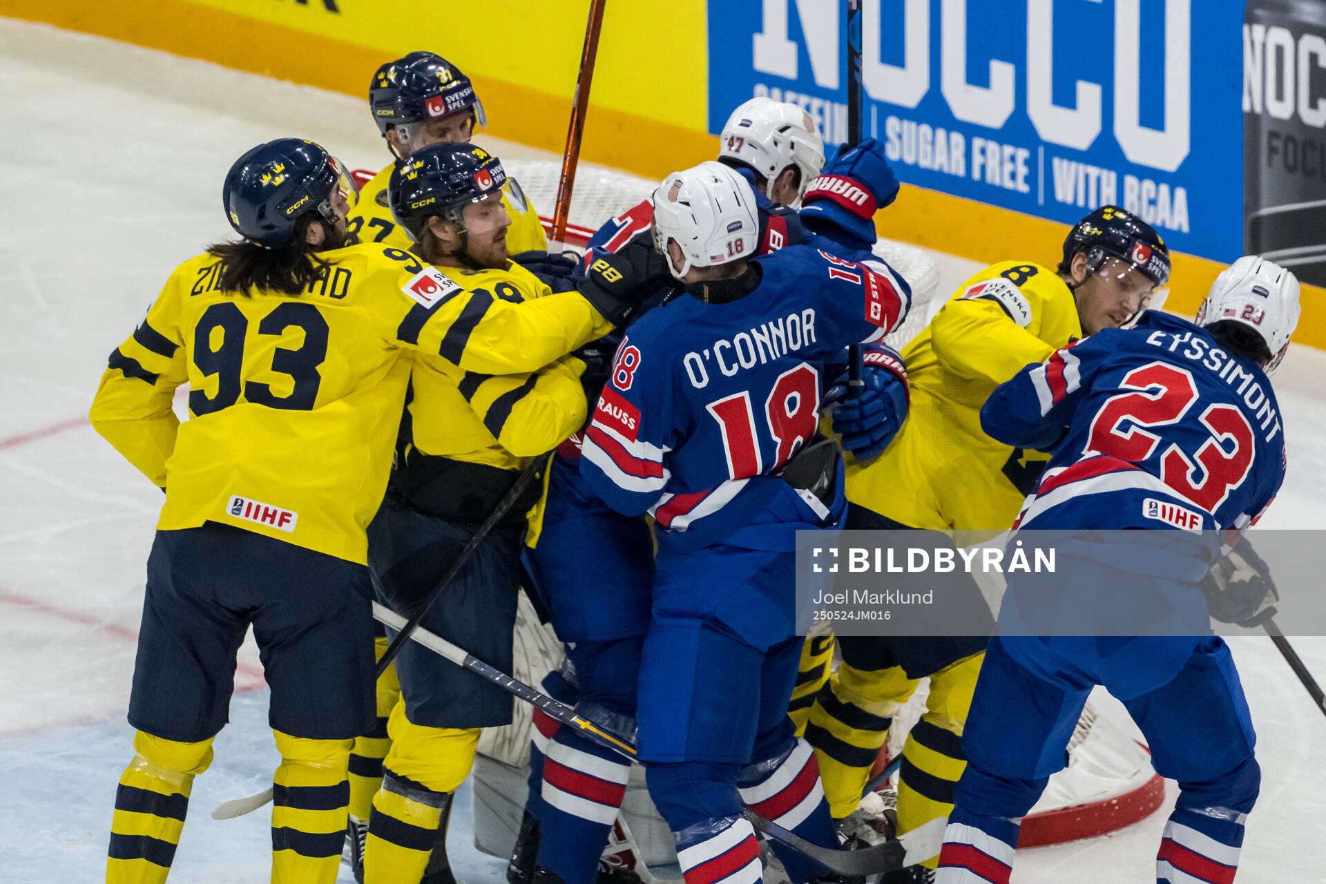 Drew O'Connor, Michael McCarron, and Michael Eyssimont of
