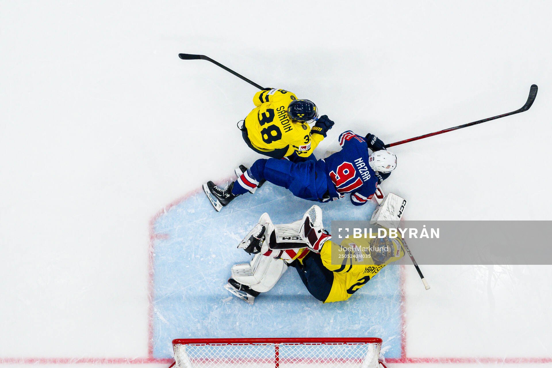 Rasmus Sandin and goaltender Jacob Markström of Sweden are